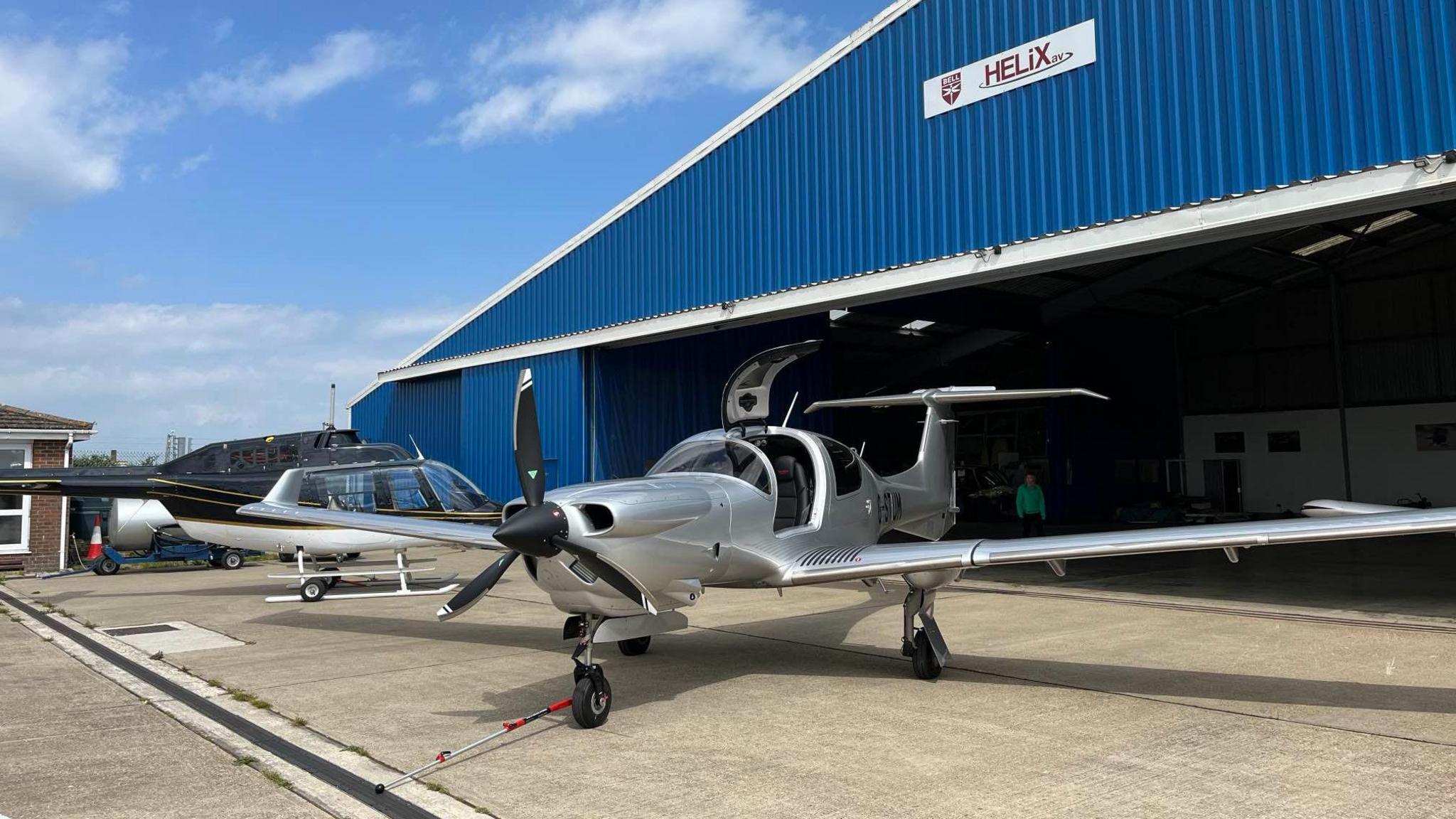 A small aircraft outside a hanger at Manston.