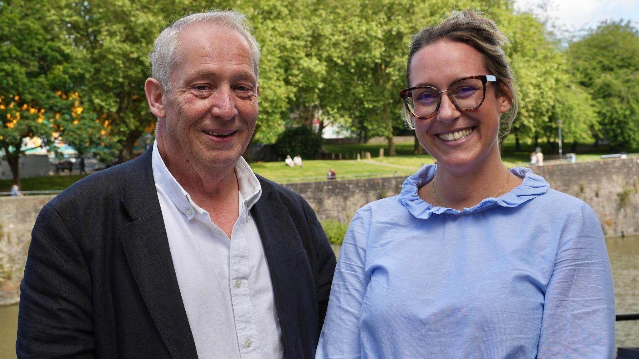 Two members of Bristol city centre BID face the camera