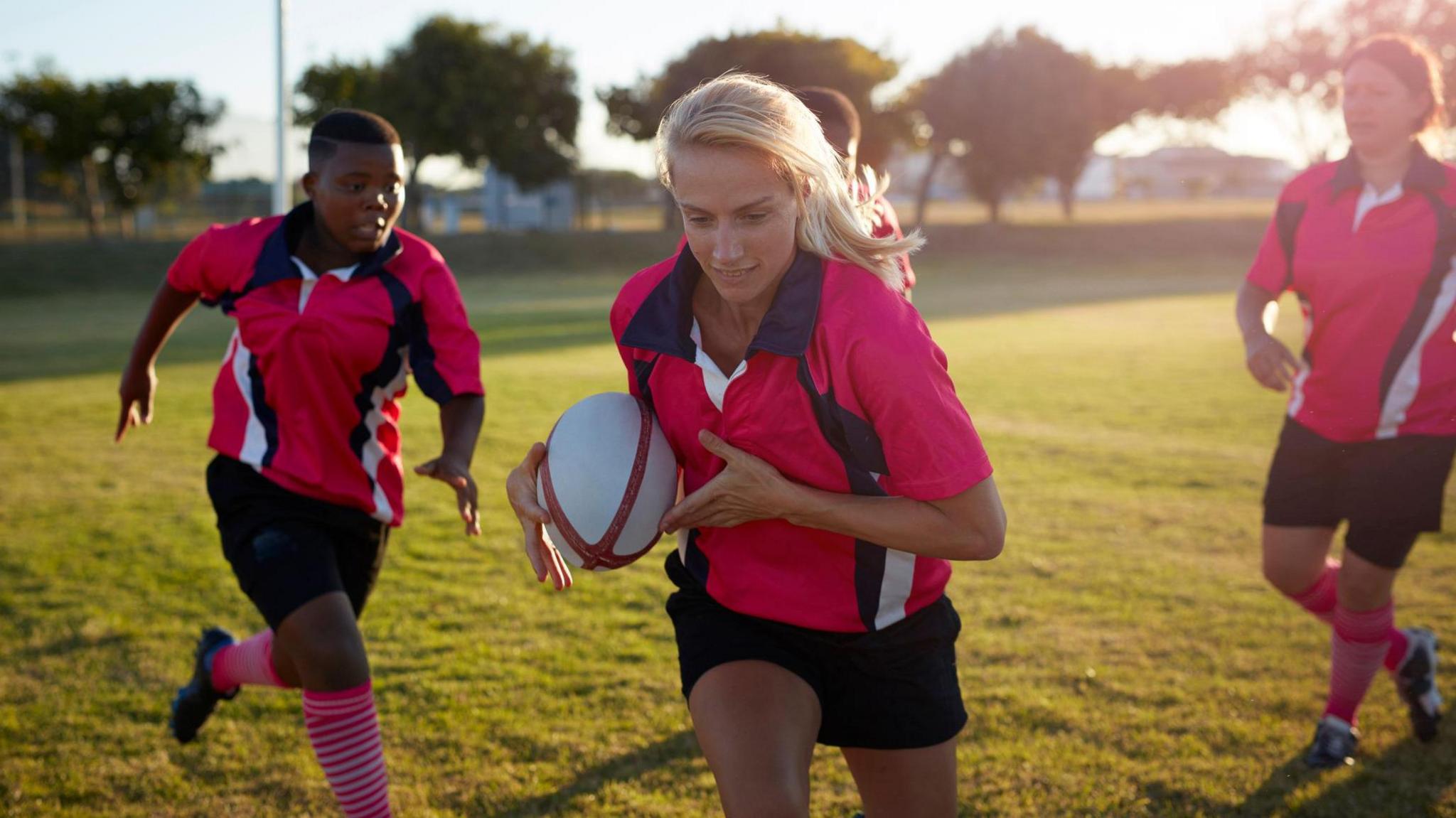 Women playing rugby
