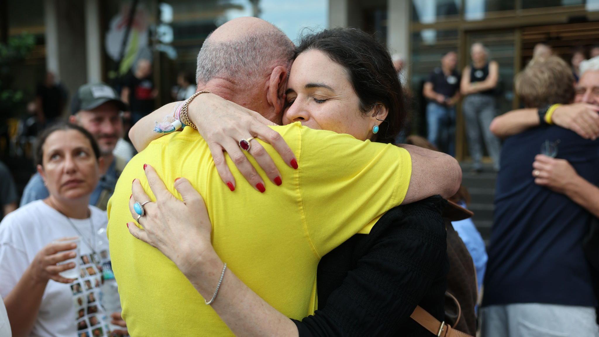 People hugging in Israel on 9 October