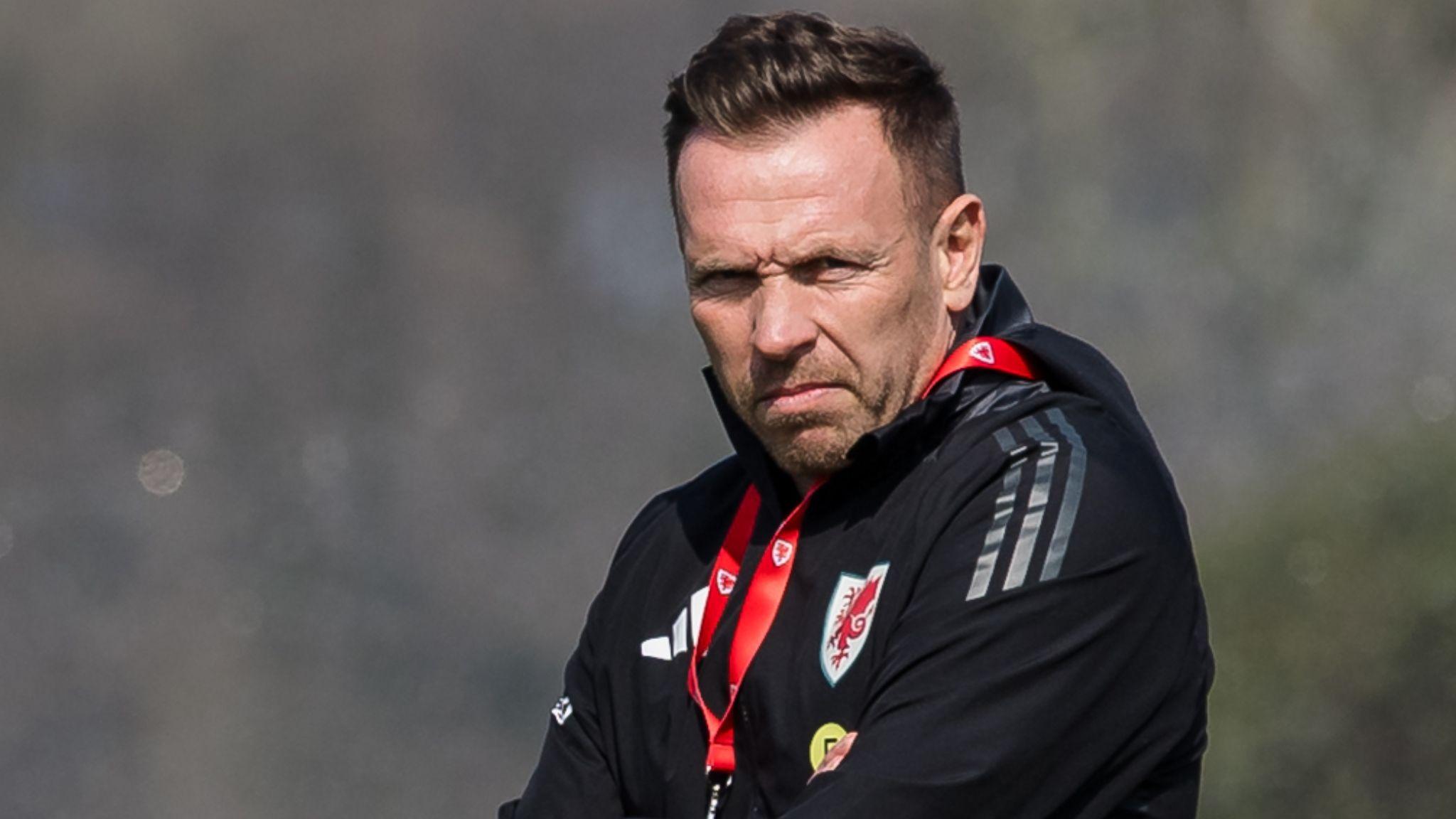 Craig Bellamy watches training
