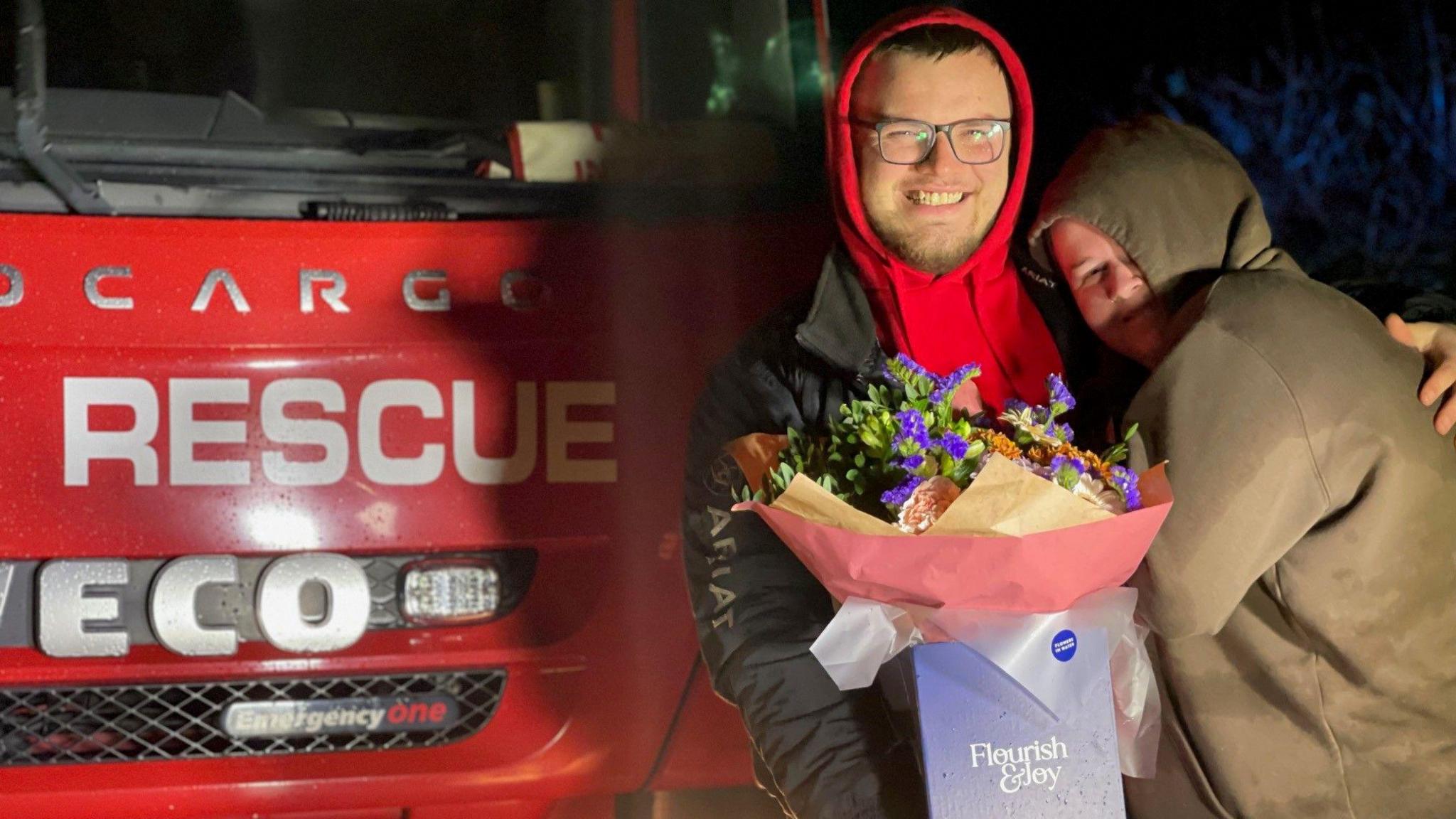 Davie Woodley-Kingston and his fiance Ashely Stevens are hugging each other in front of a fire engine. Davie is holding a bouquet of flowers.