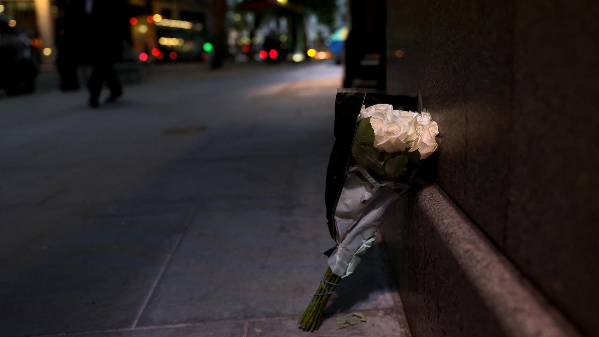 Flowers lay outside India House in central London