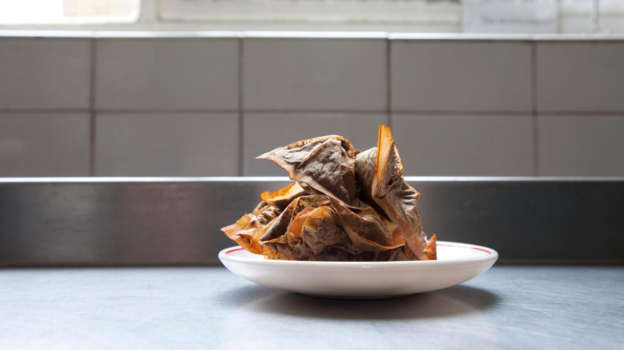 used teabags on a dish
