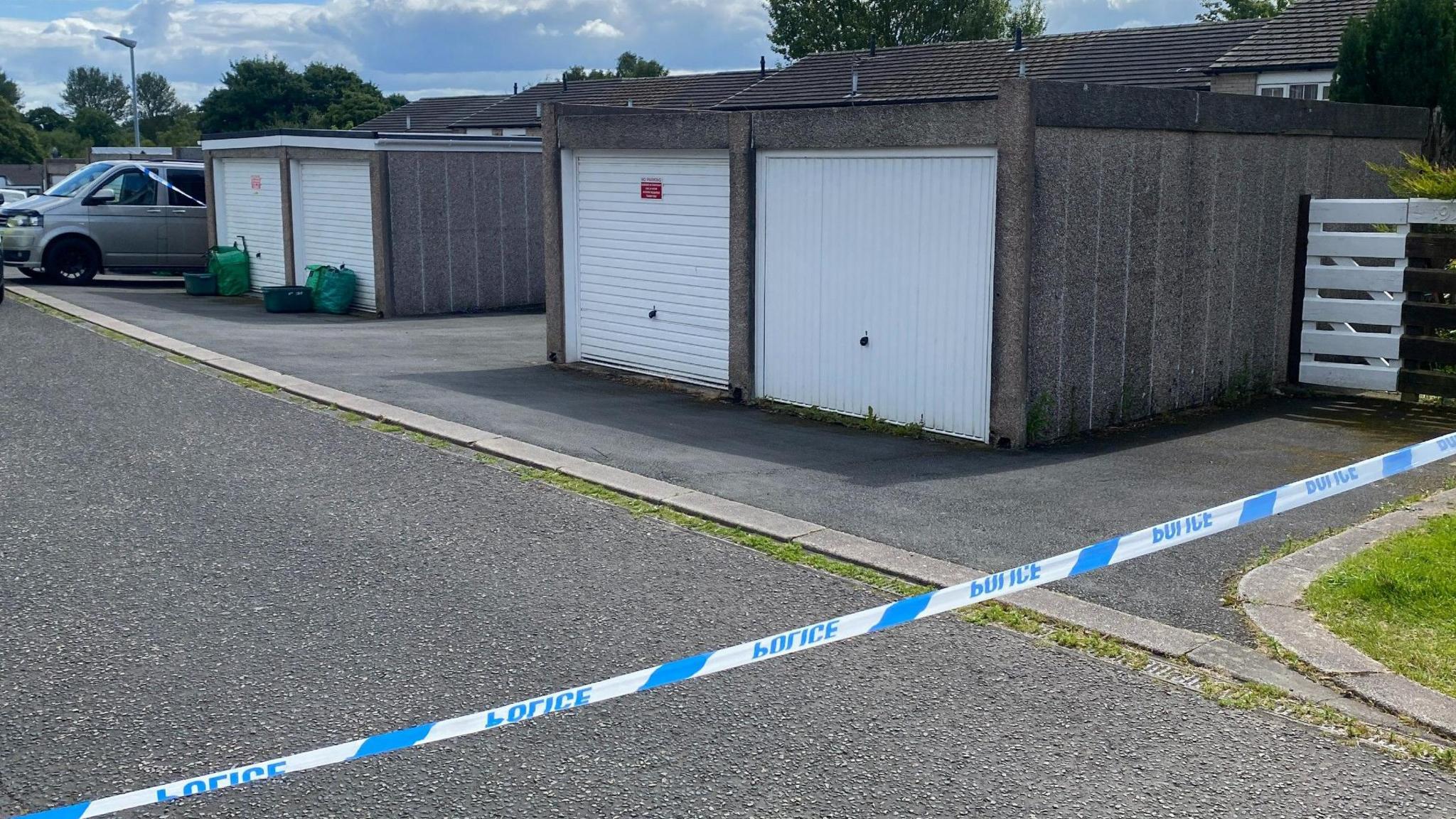 Police tape blocking access to a road in Whernside, Carlisle