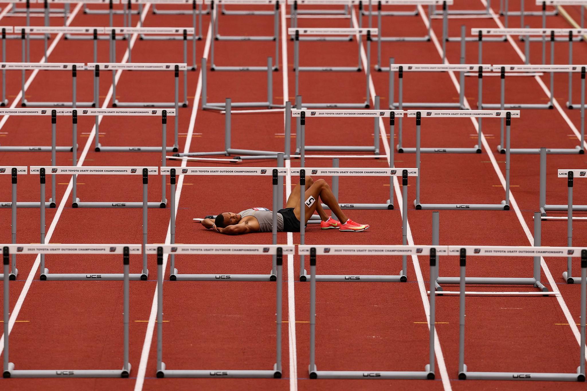 Jamal Britt reacts after falling in the PrimeTime Timing Men's 110m Hurdles final during the 2025 USATF Outdoor Championships at Hayward Field in Eugene, Oregon. Photo by Patrick Smith