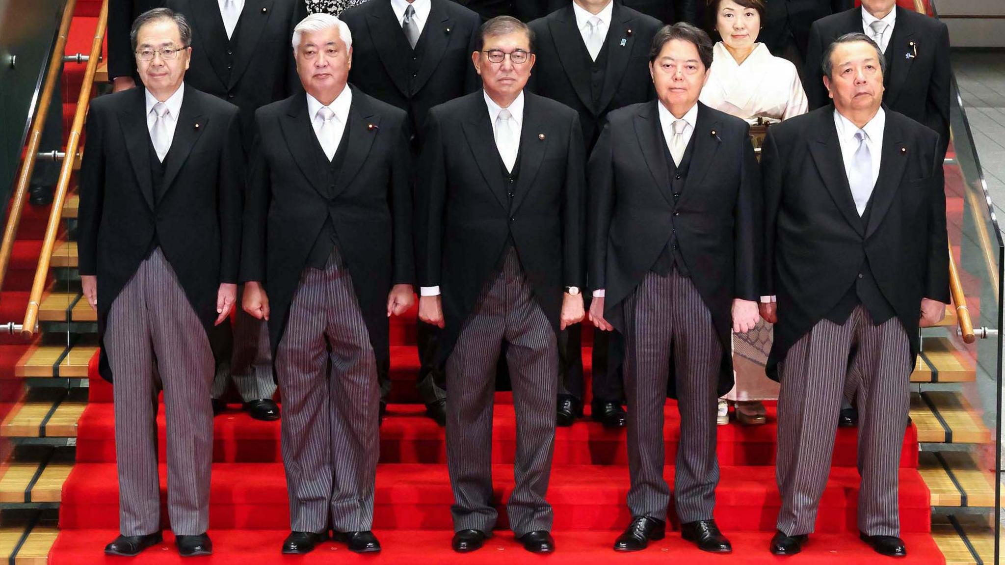 Crop of a picture of Japan's new cabinet, which the government said has been manipulated to make its members look less 'unkempt'