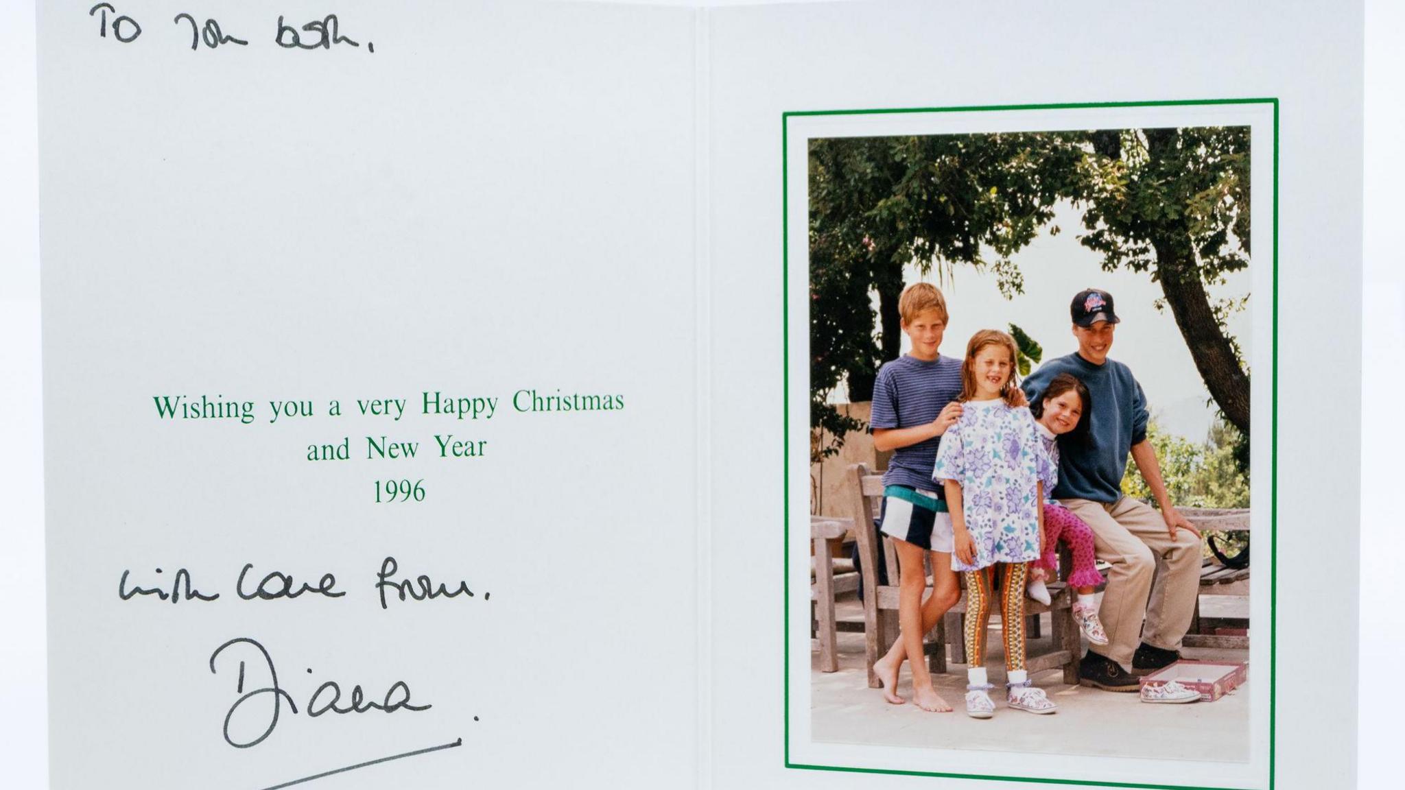 A Christmas card from the late Diana, Princess of Wales, showing a handwritten note from her and a photo of William and Harry with two girls - possibly Beatrice and Eugenie 