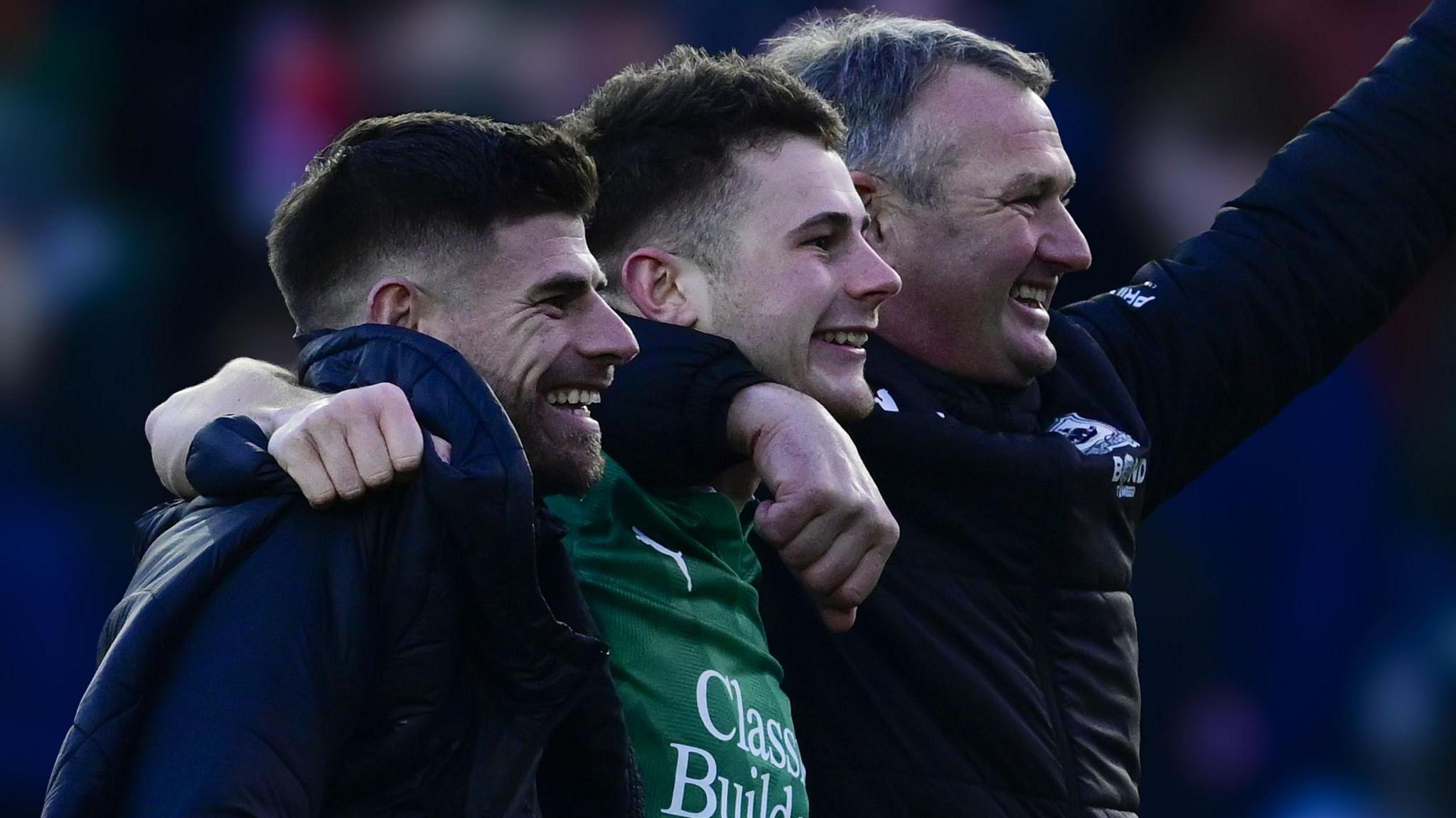 Joe Edwards, Adam Randell and Kevin Nancekivell celebrate