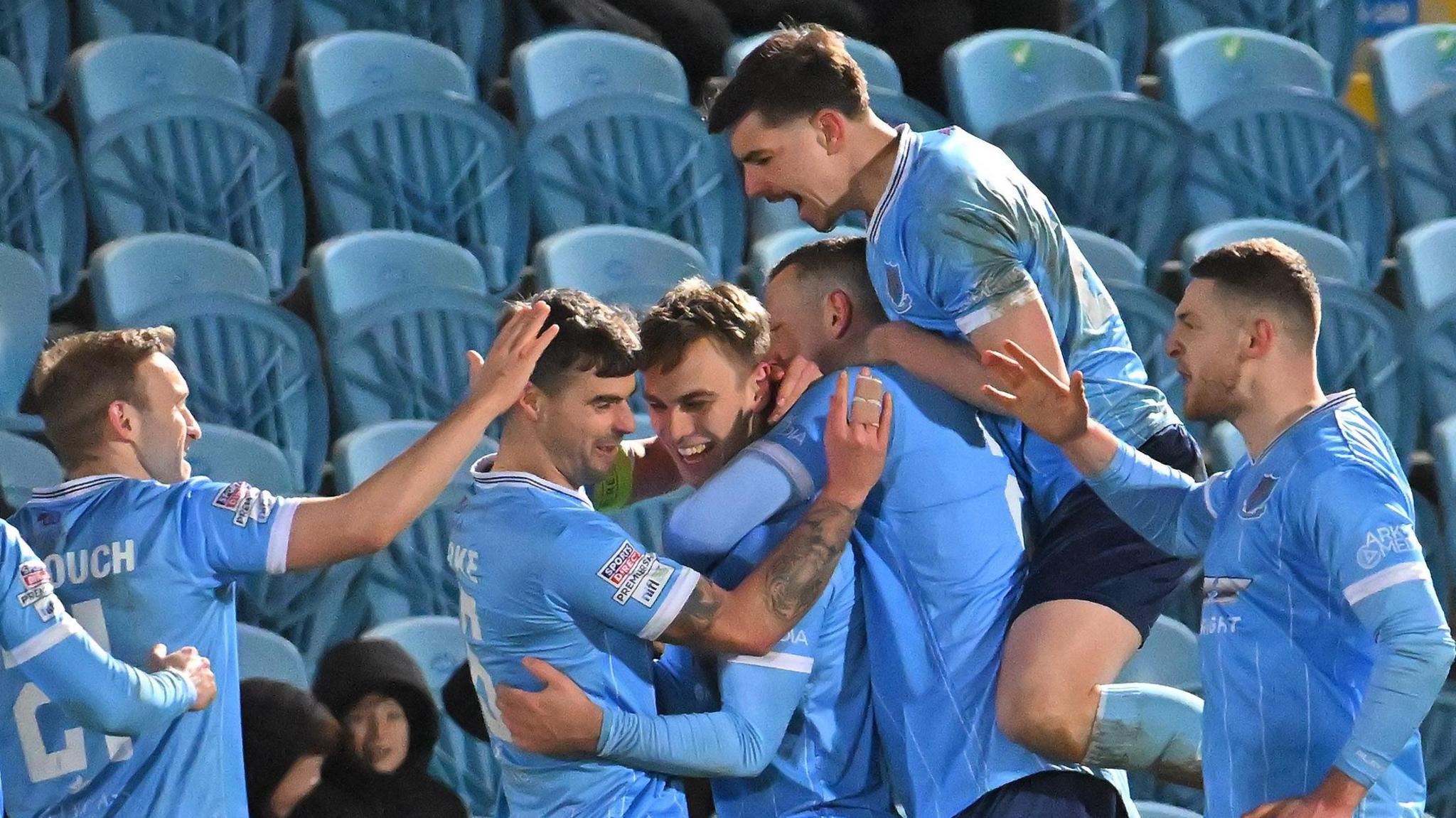 Ballymena celebrating