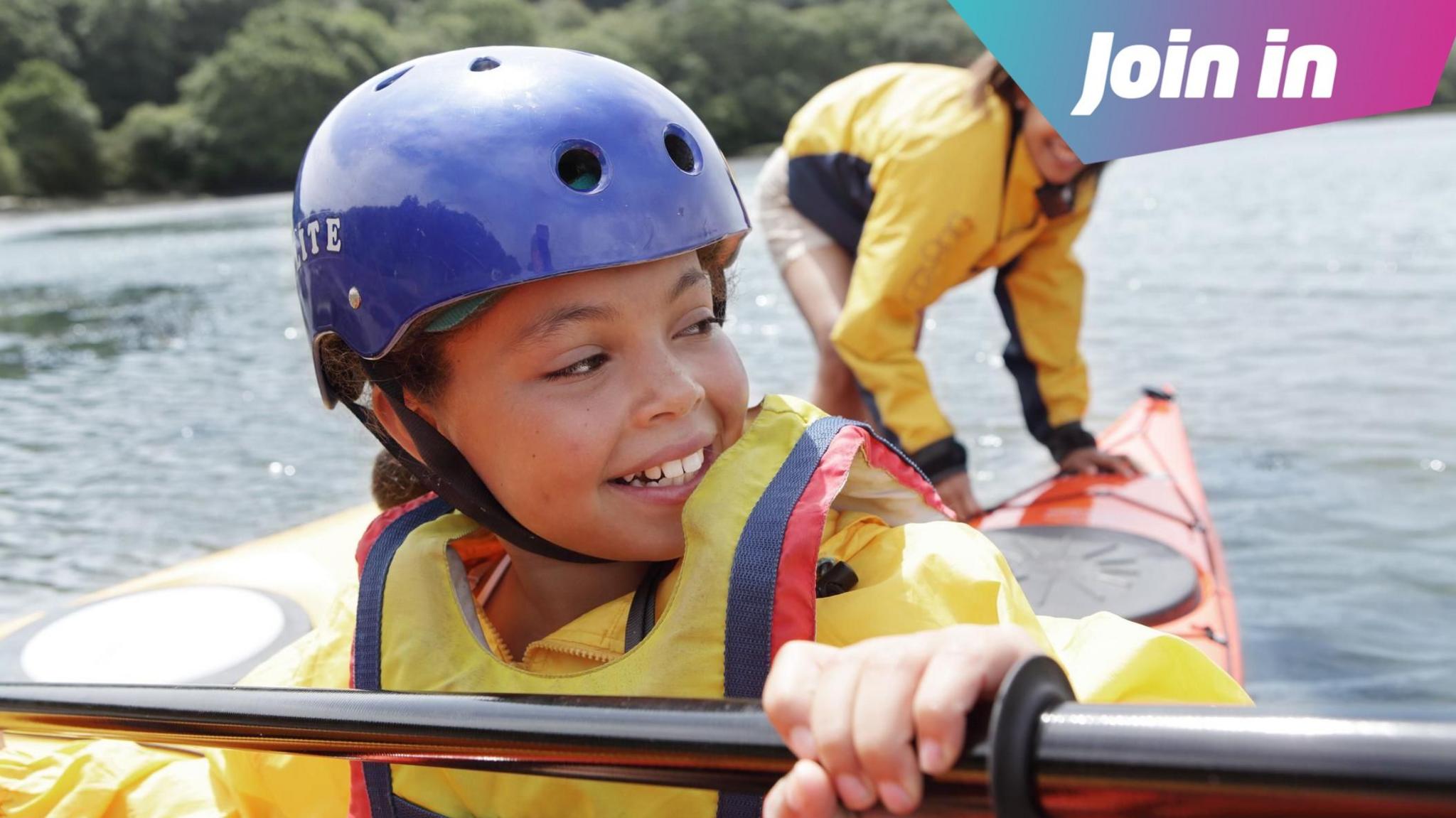 child in a canoe