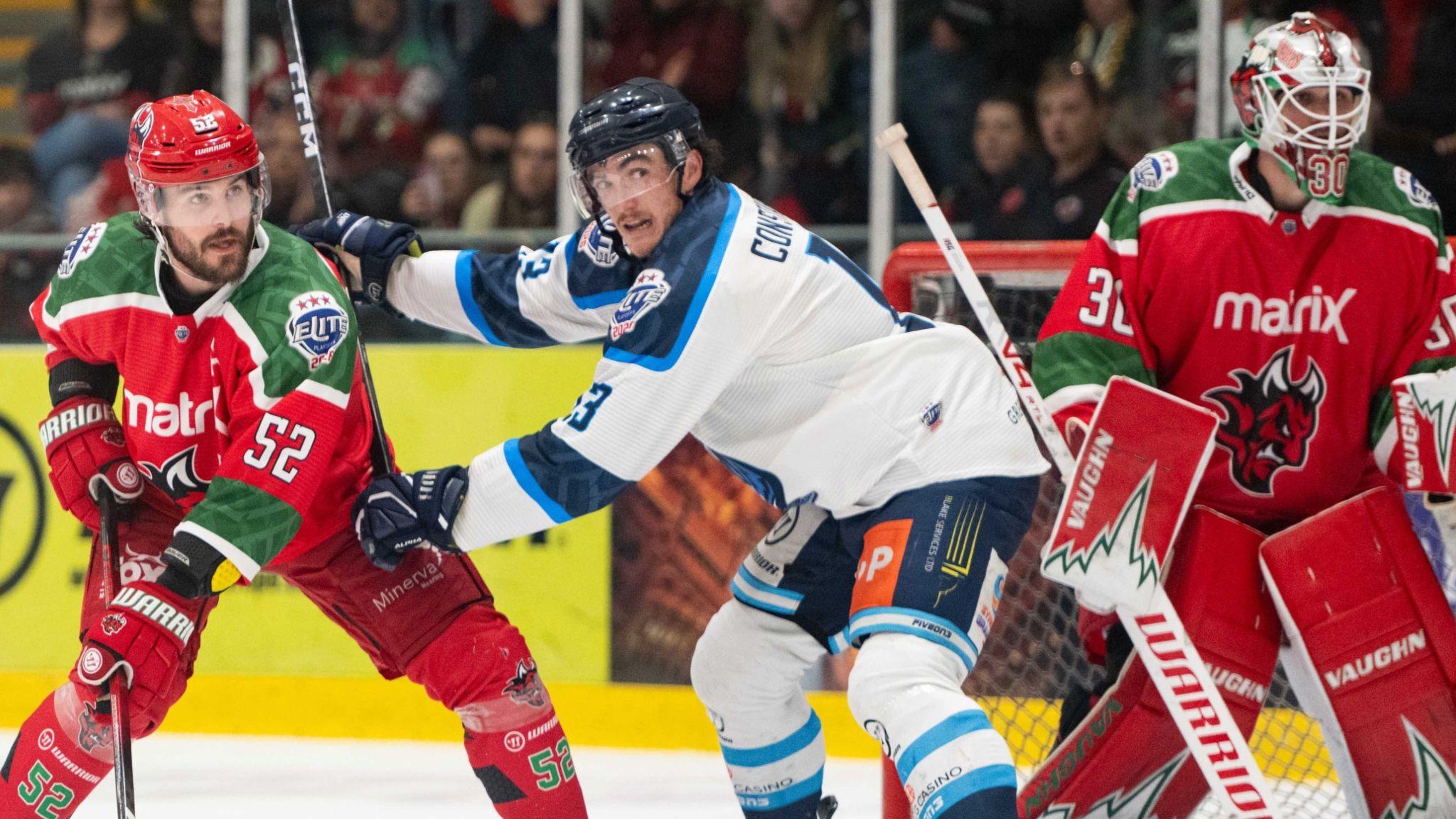 Jimmy Oligny (left) defends for Cardiff against Coventry's Grayson Constable