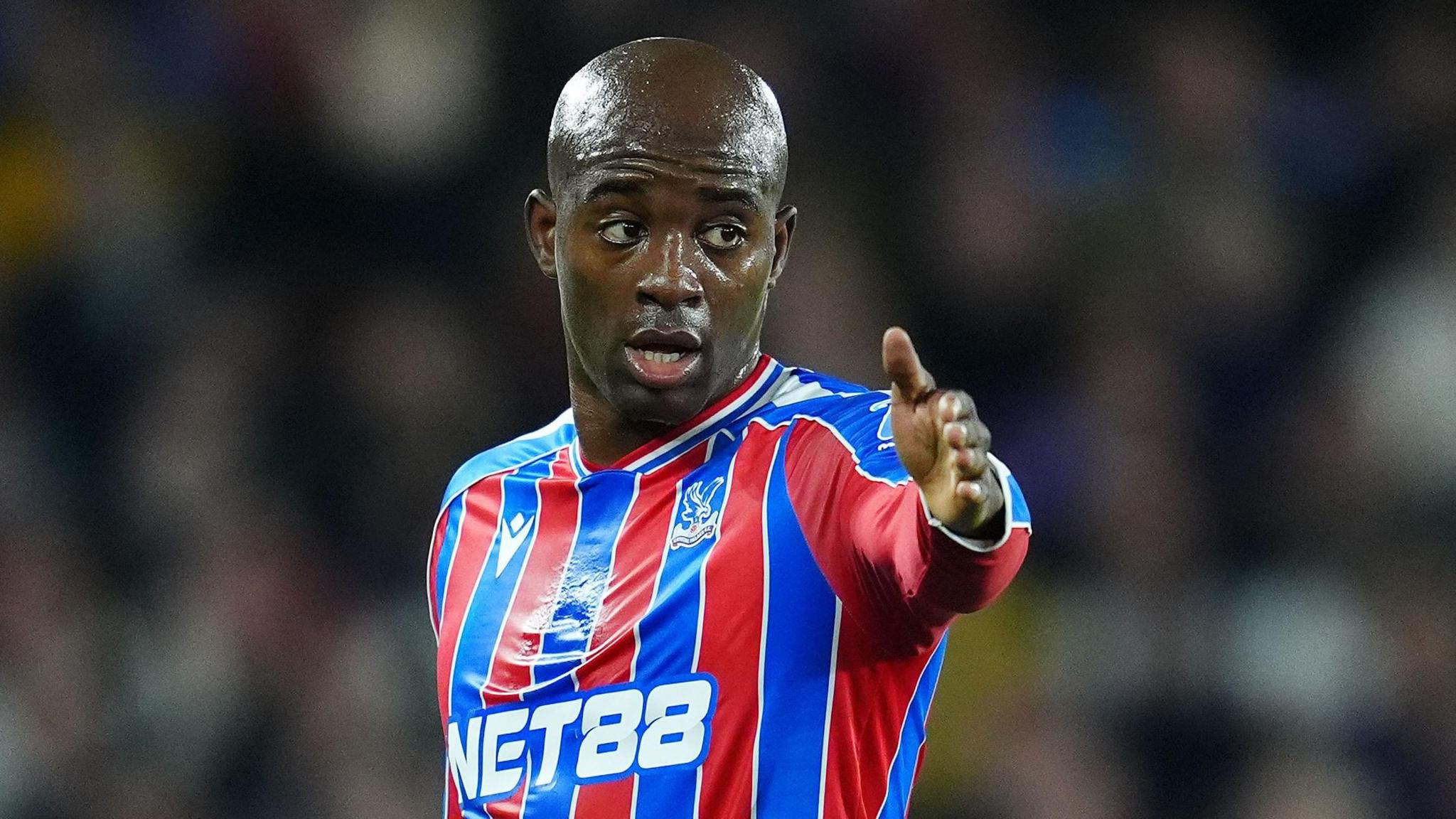 Jean-Philipe Mateta pointing while in action for Crystal Palace