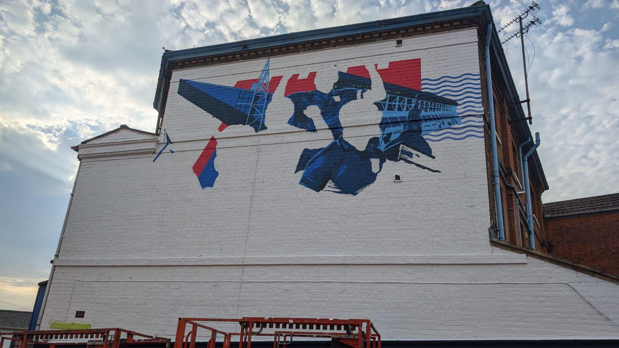 The Ipswich Town mural in the early stages of painting