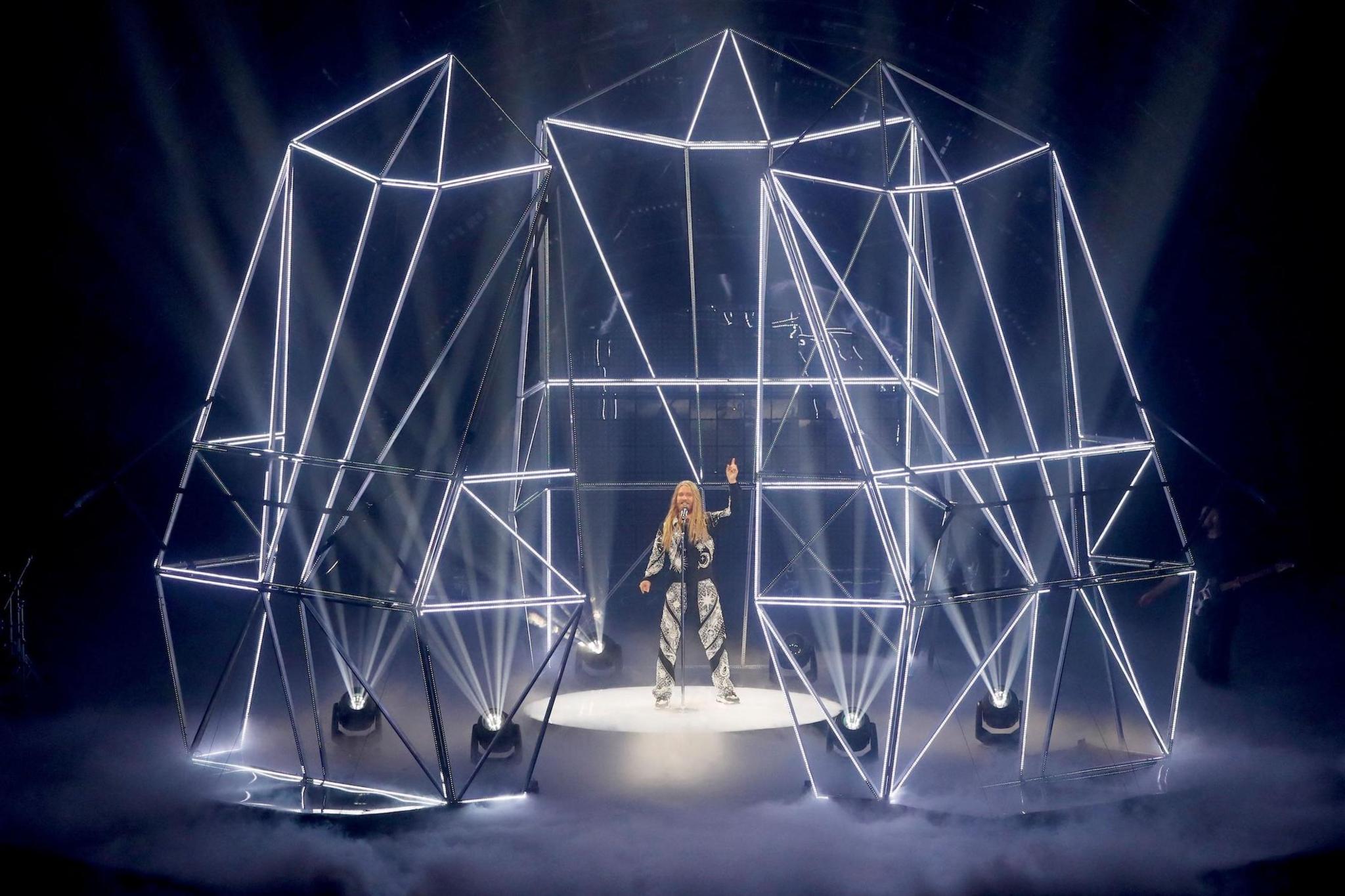 Sam Ryder performs inside an elaborate lighting rig at the 2022 Eurovision Song Contest