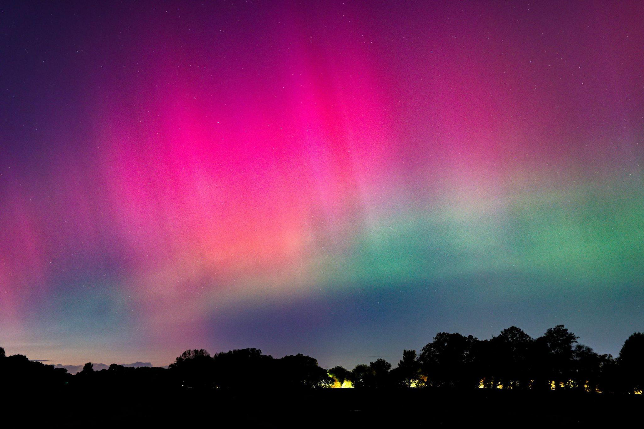 Pink and blue Northern Lights over Moor Park