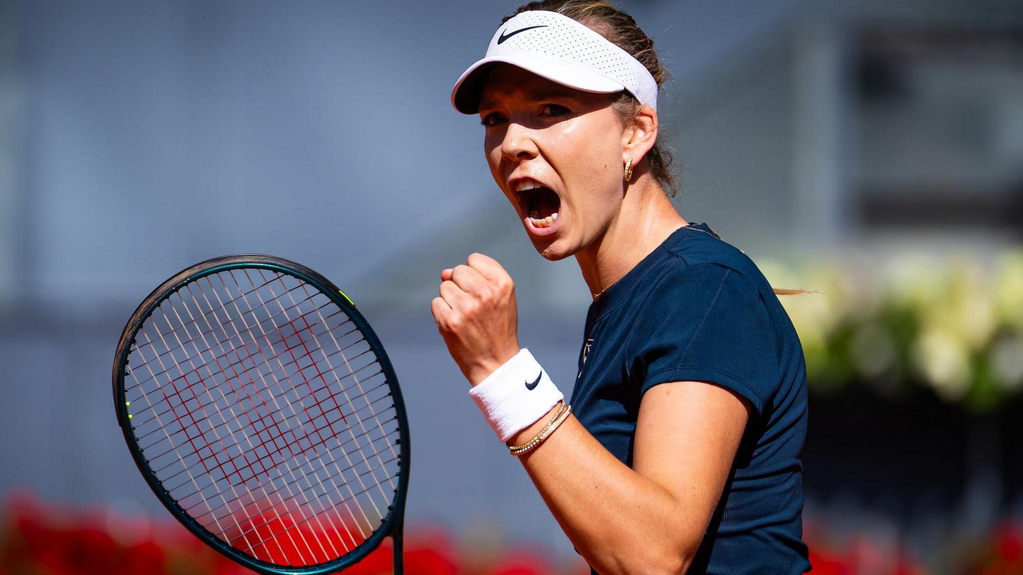 Britain's Katie Boulter celebrates winning a point at the Madrid Open