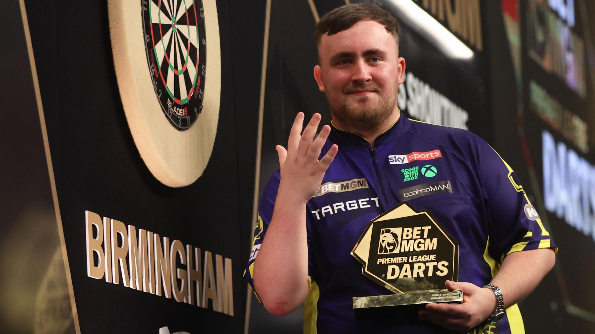 Luke Littler celebrates winning his fifth Premier League night of the 2025 season in Birmingham