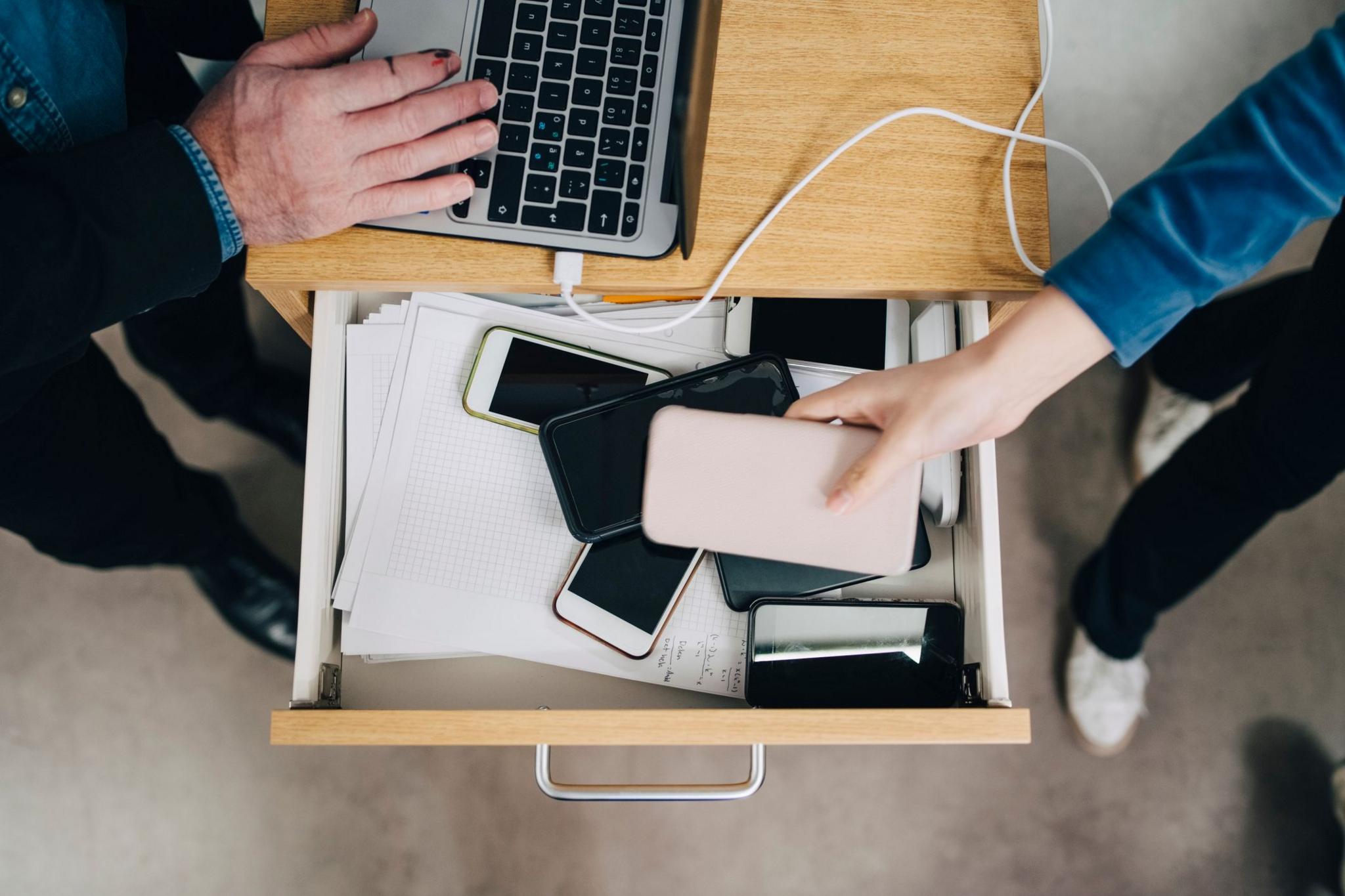 Drawer with mobile phones inside