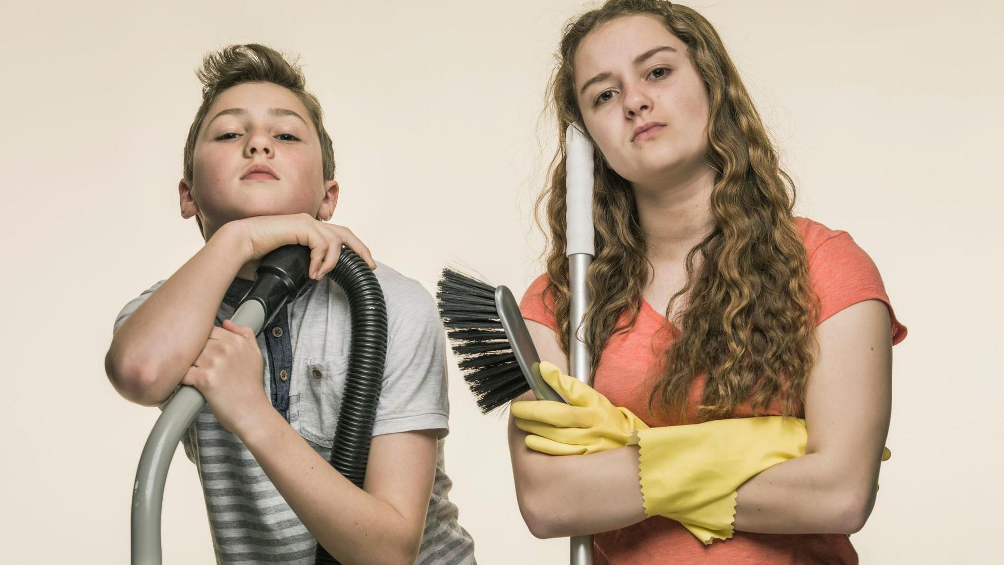 Boy and girl doing domestic chores.