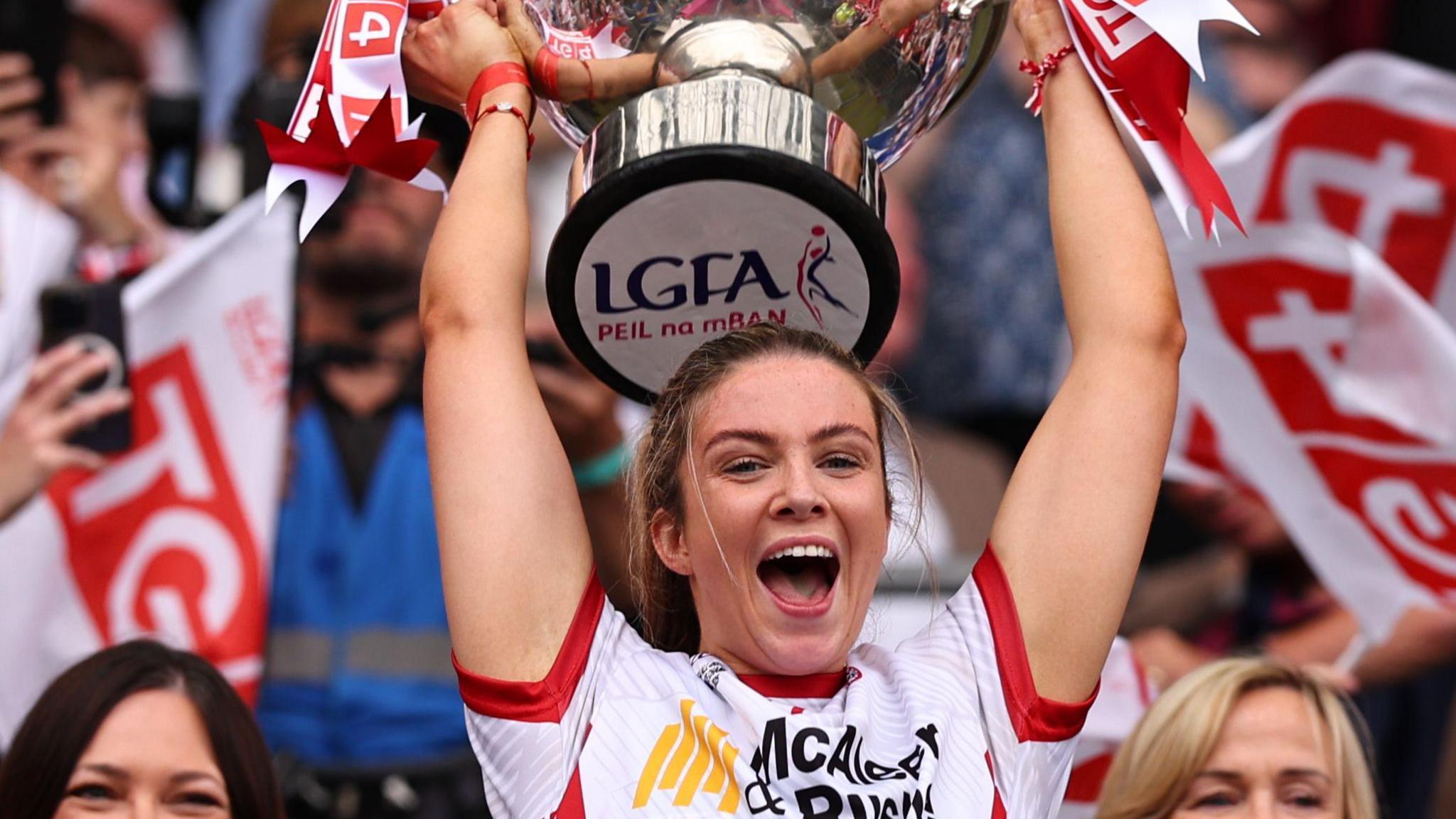 Tyrone captain Aoibhinn McHugh lifts the Mary Quinn Memorial Cup