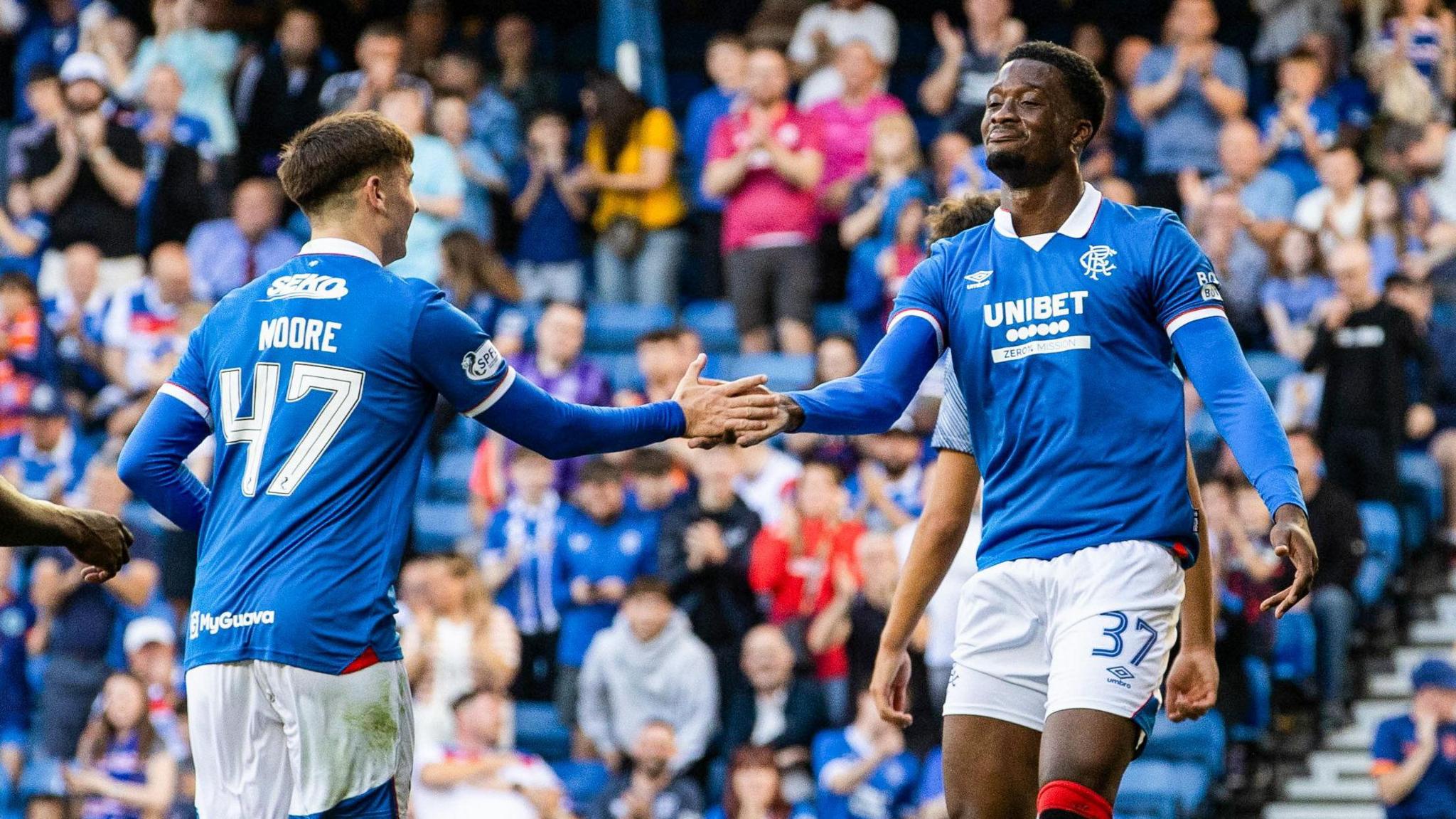 Mikey Moore celebrates with Emmanuel Fernandez