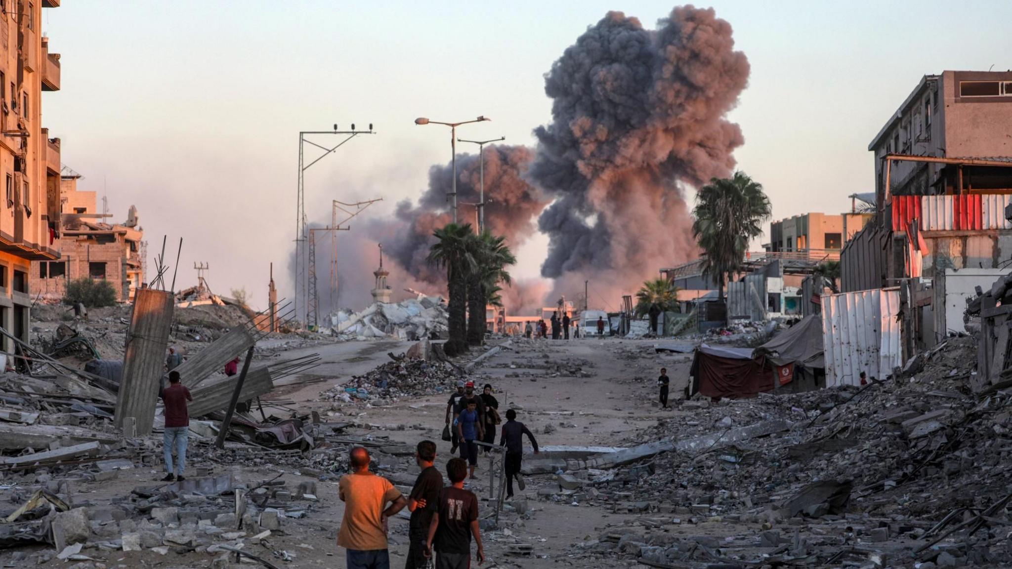 Smoke rises following Israeli air strikes near the Islamic University in Gaza City, northern Gaza (7 October 2025)