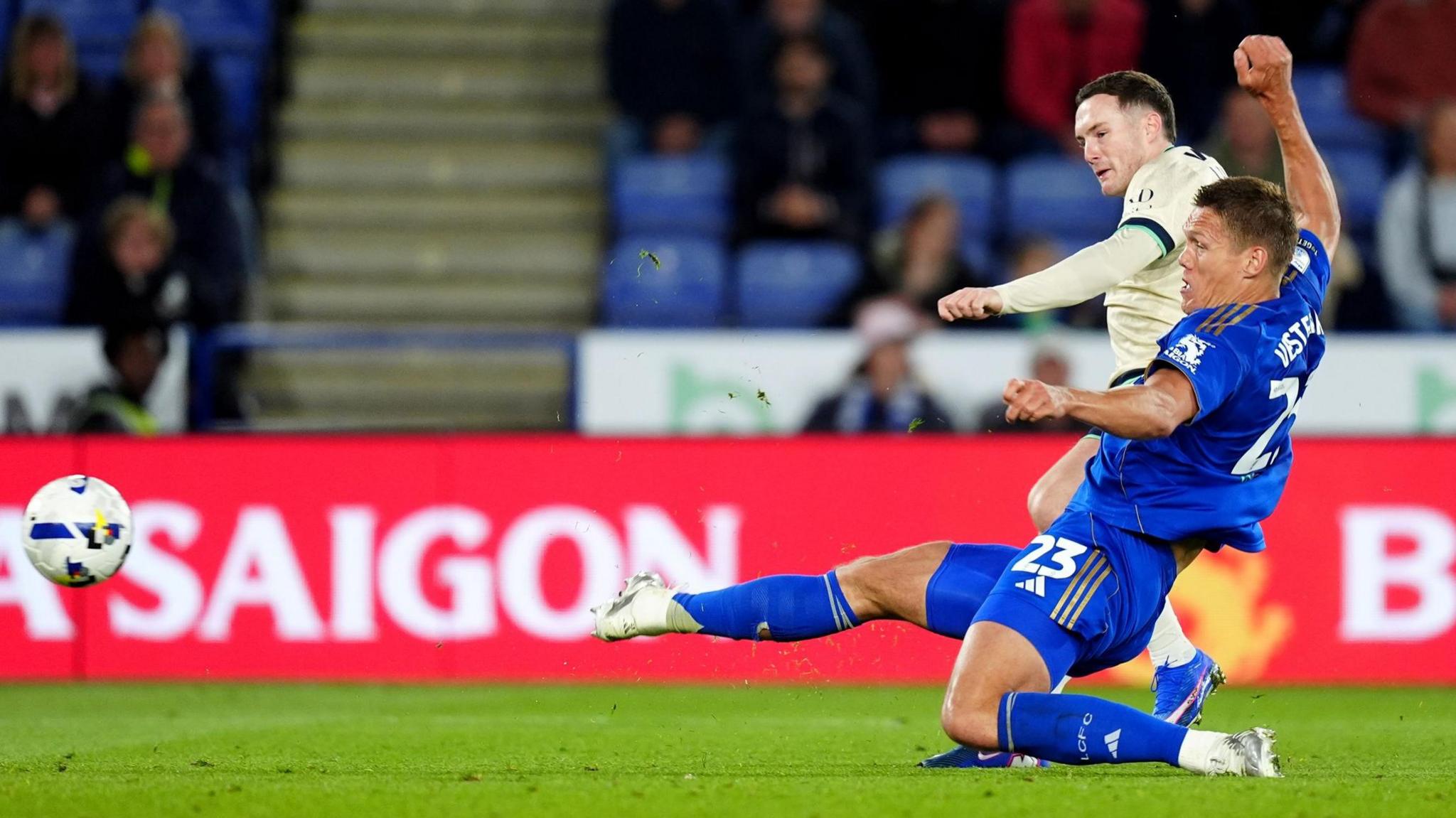 Millwall's Macaulay Langstaff shoots and scored late on against Leicester City