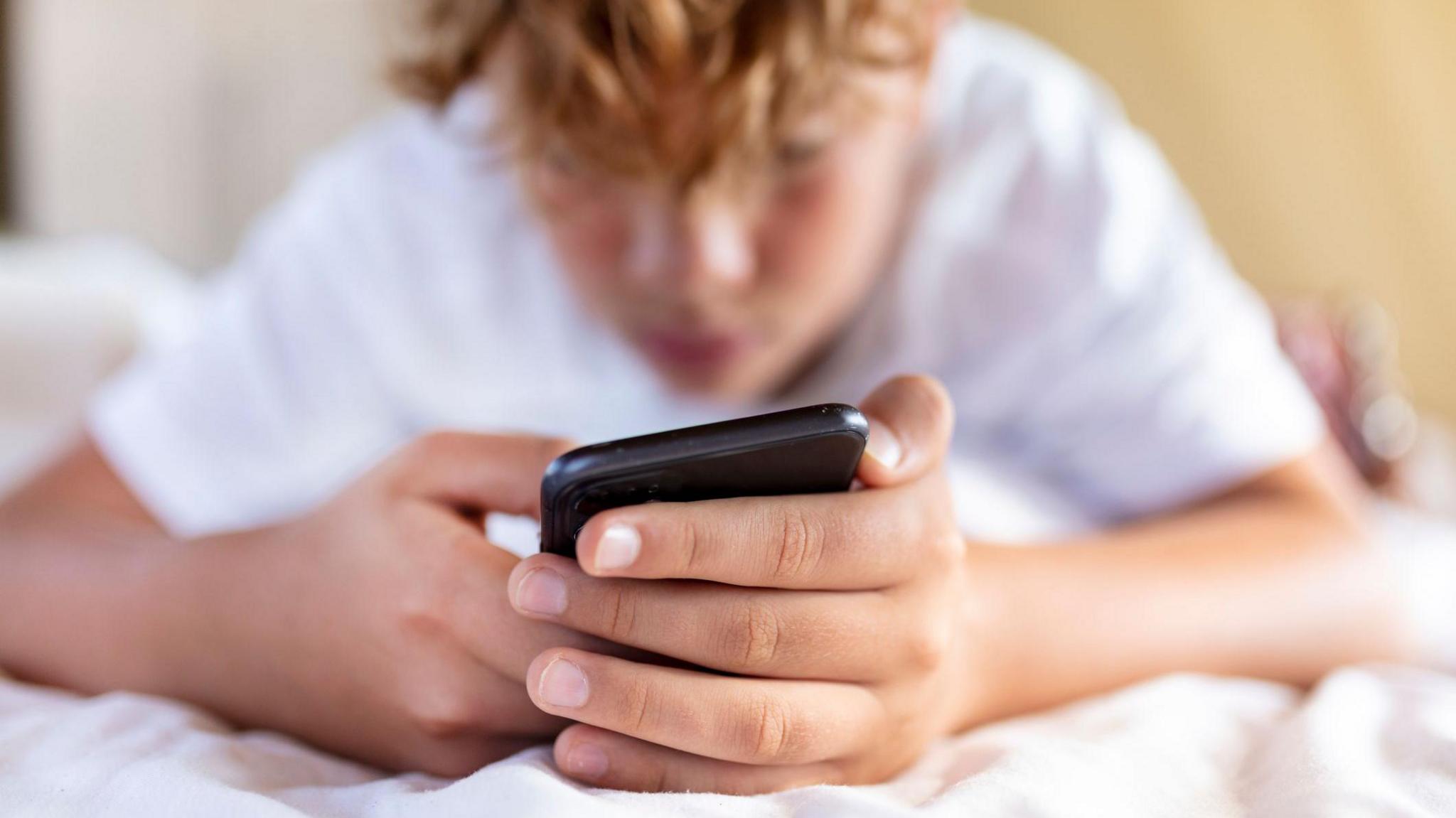 Boy using phone