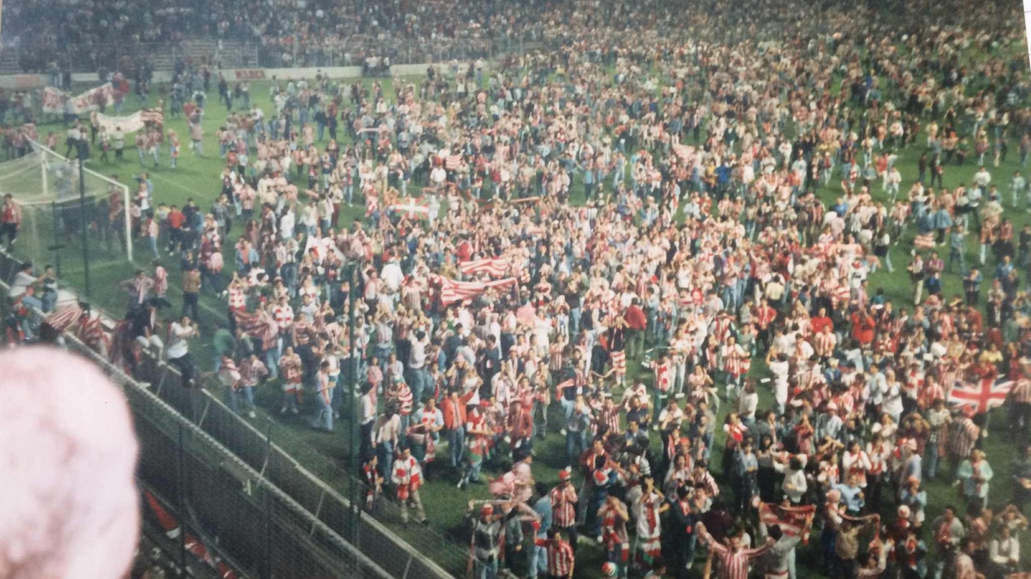 Athletic Club supporters invade the pitch to applaud Newcastle United fans after a 1-0 win in the Uefa Cup on 1 November, 1994