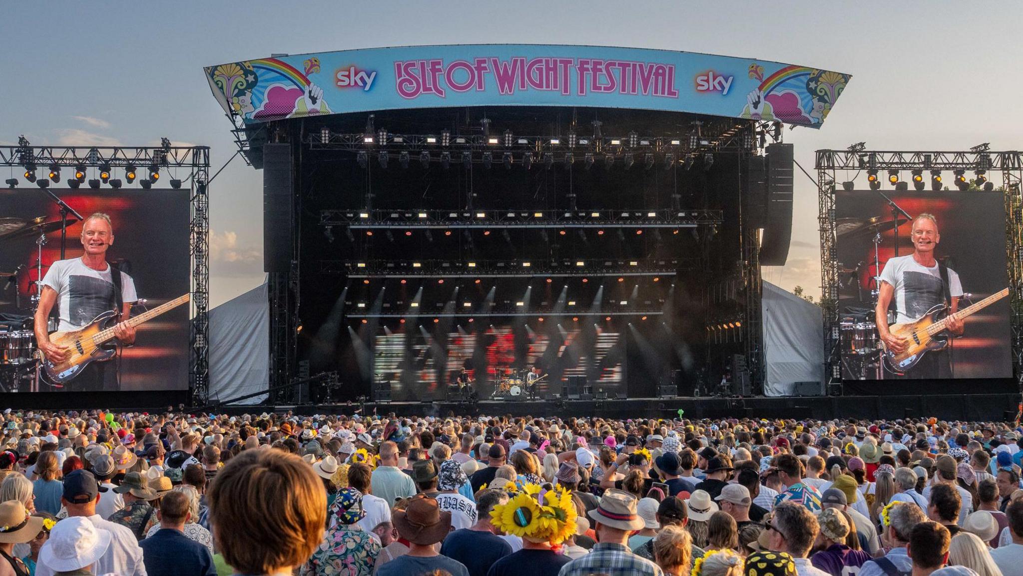 A shot of Sting from the crowd, displayed on the big festival screens.
