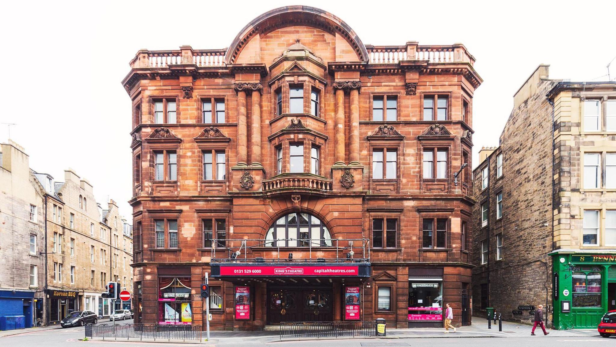 The front of the King's Theatre from the outide. It is a red sandstone colour.