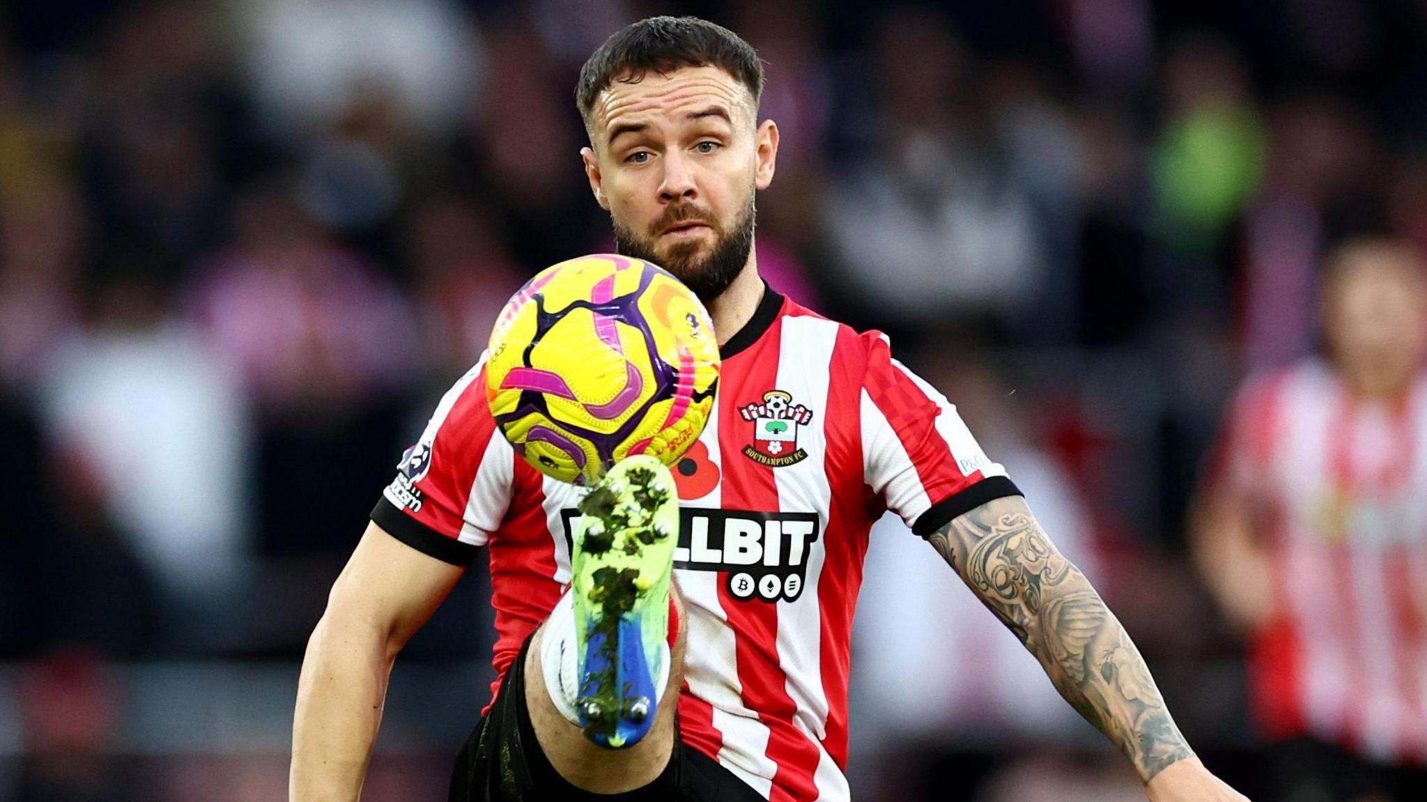 Adam Armstrong controls the ball while in action for Southampton earlier in the season