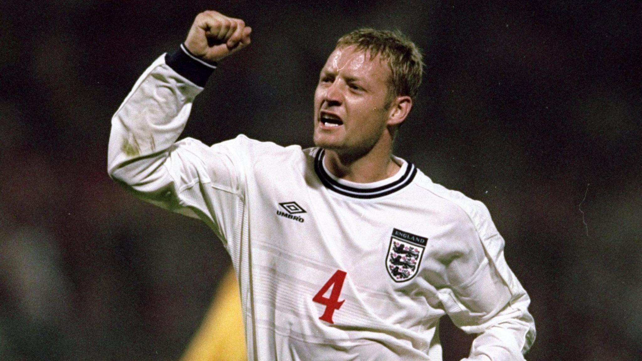 David Batty gees up the crowd during England's European Championship qualifier against Poland at the Legia Stadium in Warsaw on 8 September, 1999