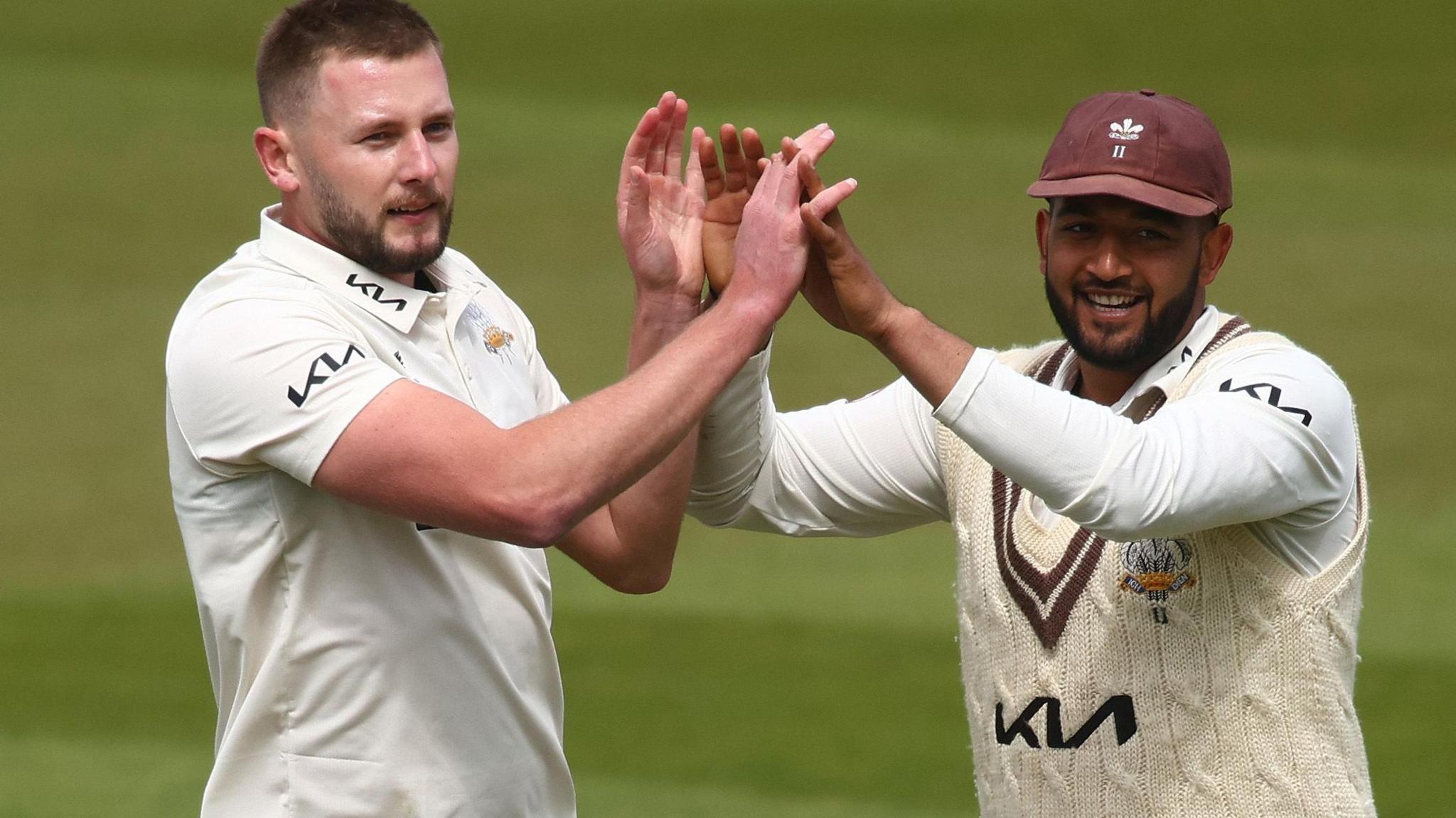 Surrey celebrate taking a wicket