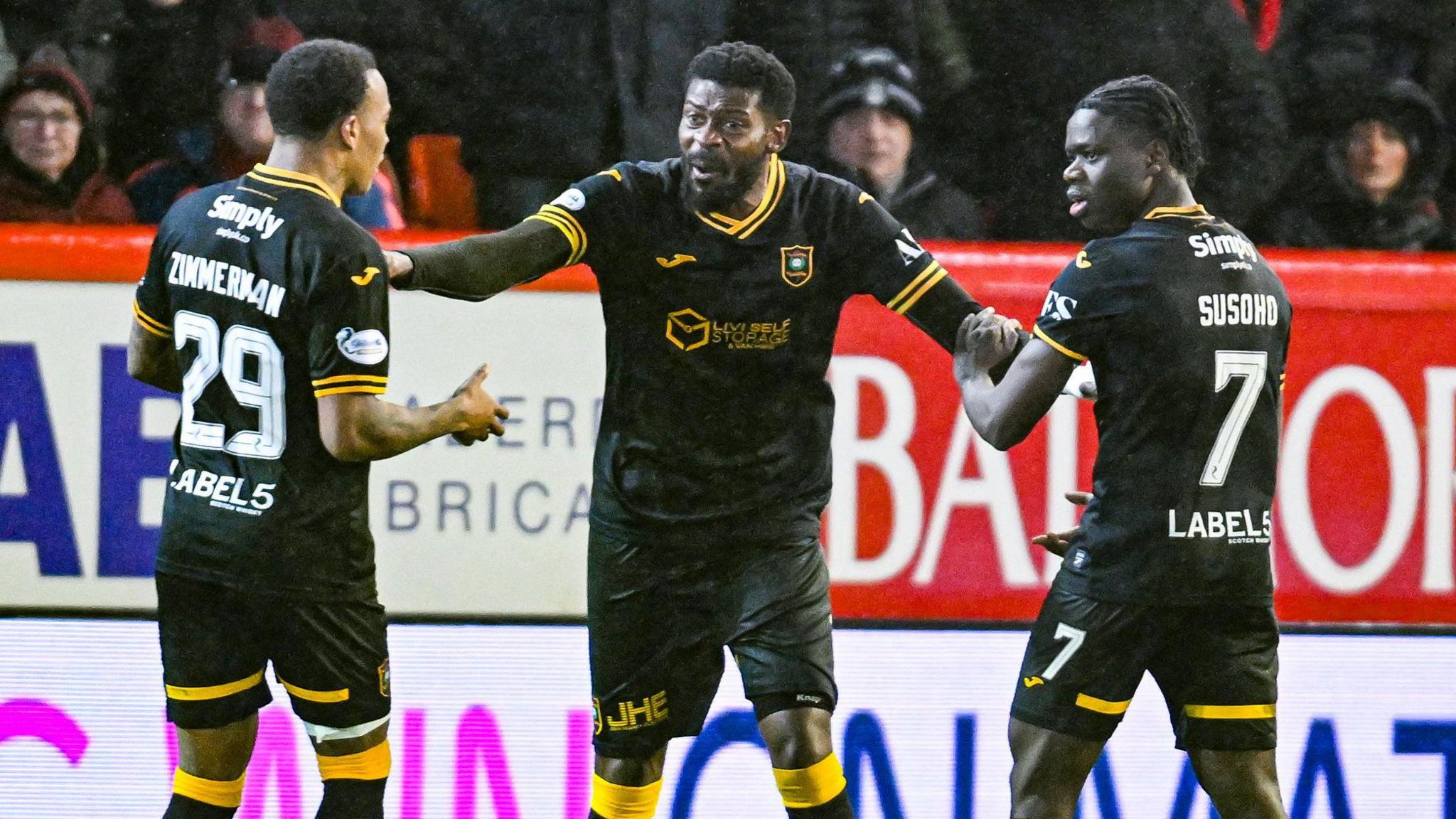 Jeremy Bokila with Joshua Zimmerman and Mhamadou Susoho