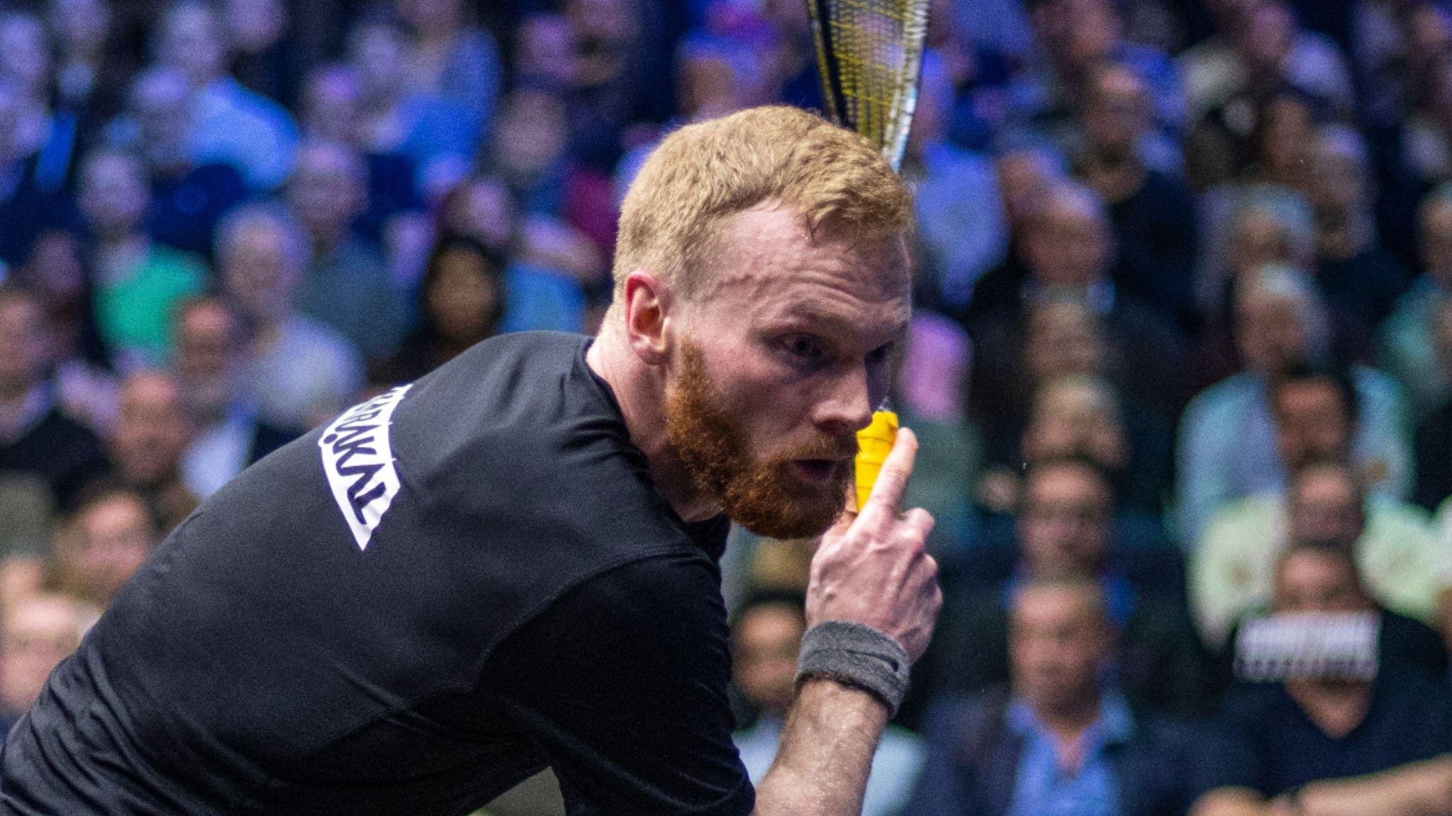 Squash player Joel Makin concentrates on the ball