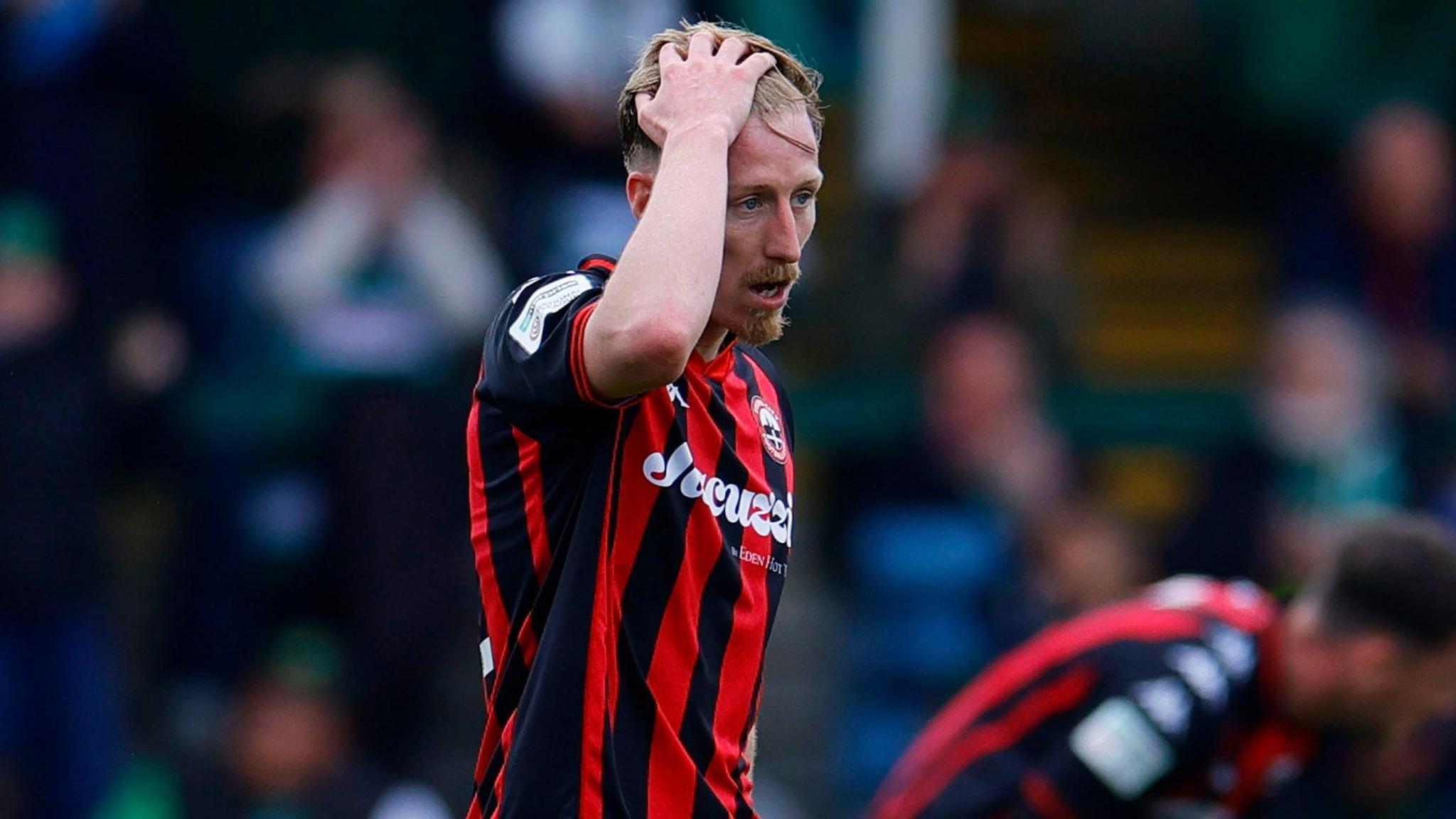 Dejected Truro City player