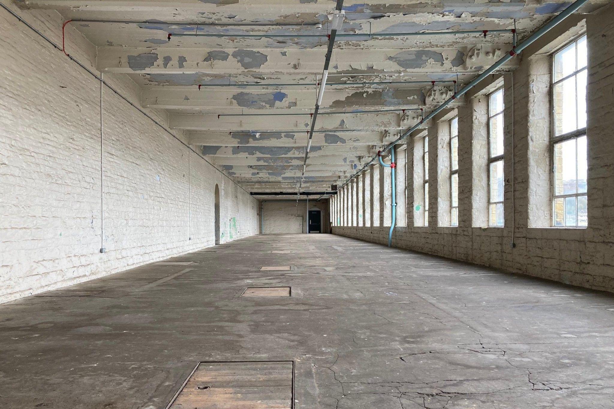 A huge empty room inside Salts Mill in Shipley 