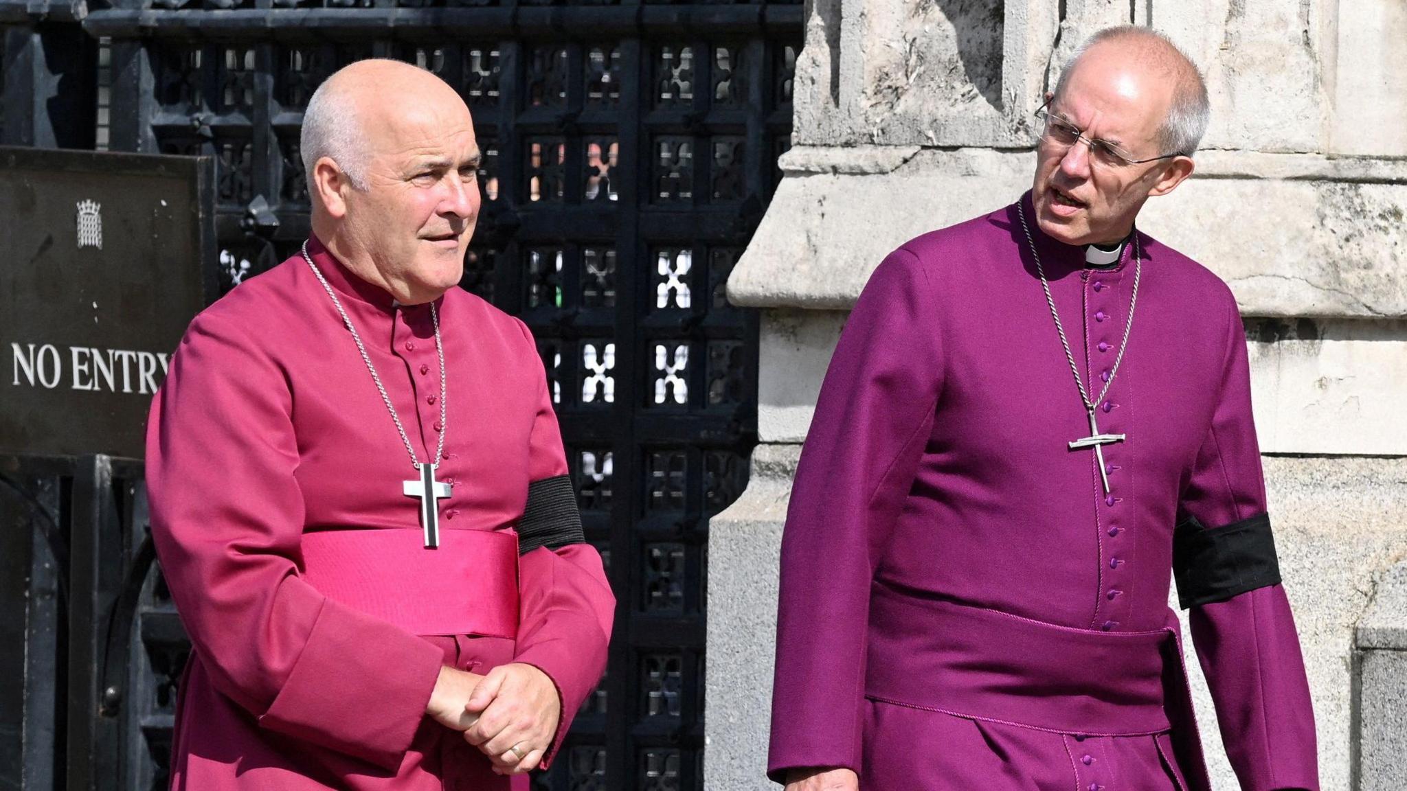 Archbishop of York Stephen Geoffrey Cottrell (L) and The Archbishop of Canterbury Justin Welby walk in central London