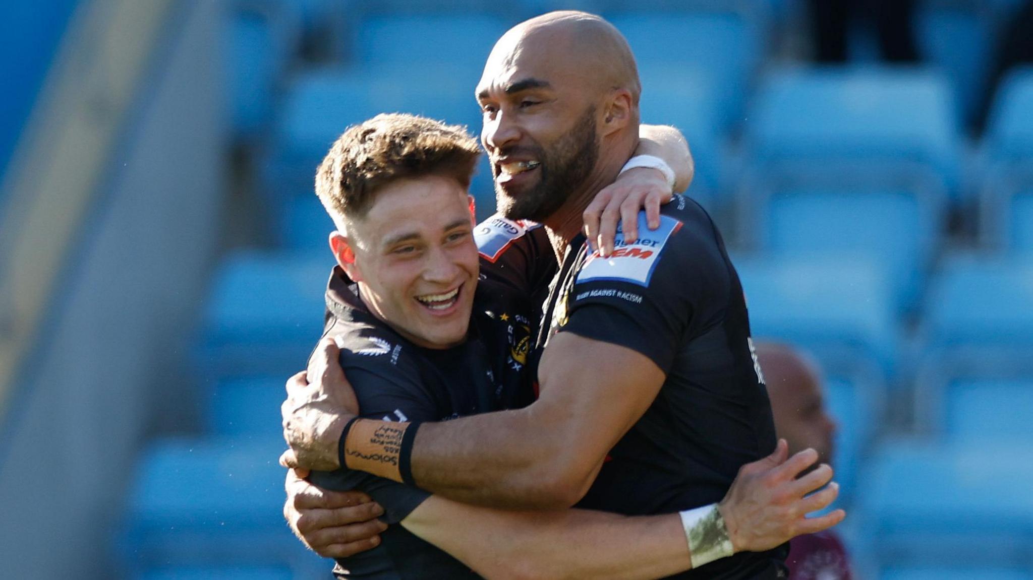 Stephen Varney and Olly Woodburn celebrate a try for Exeter