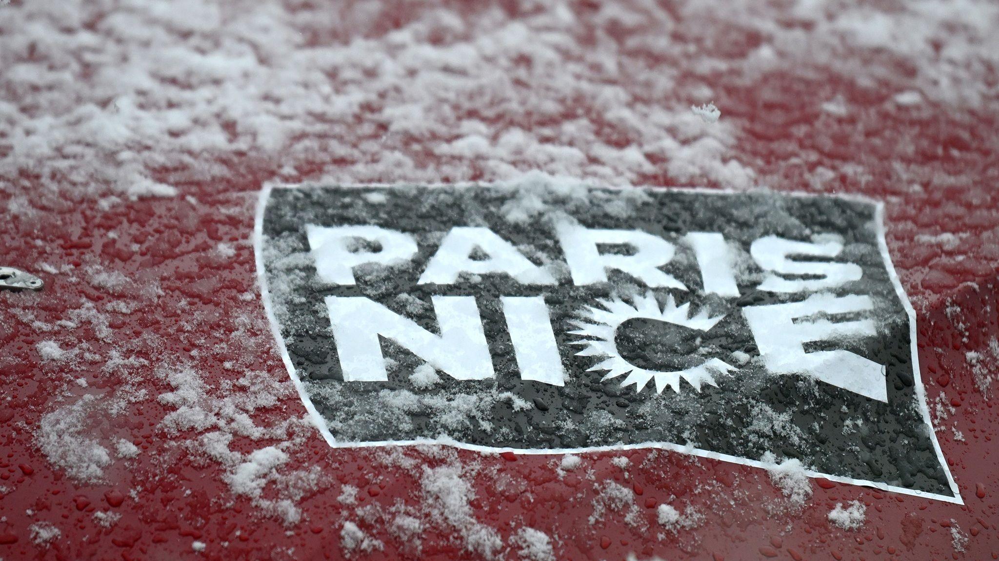 The Paris-Nice sign covered in snow