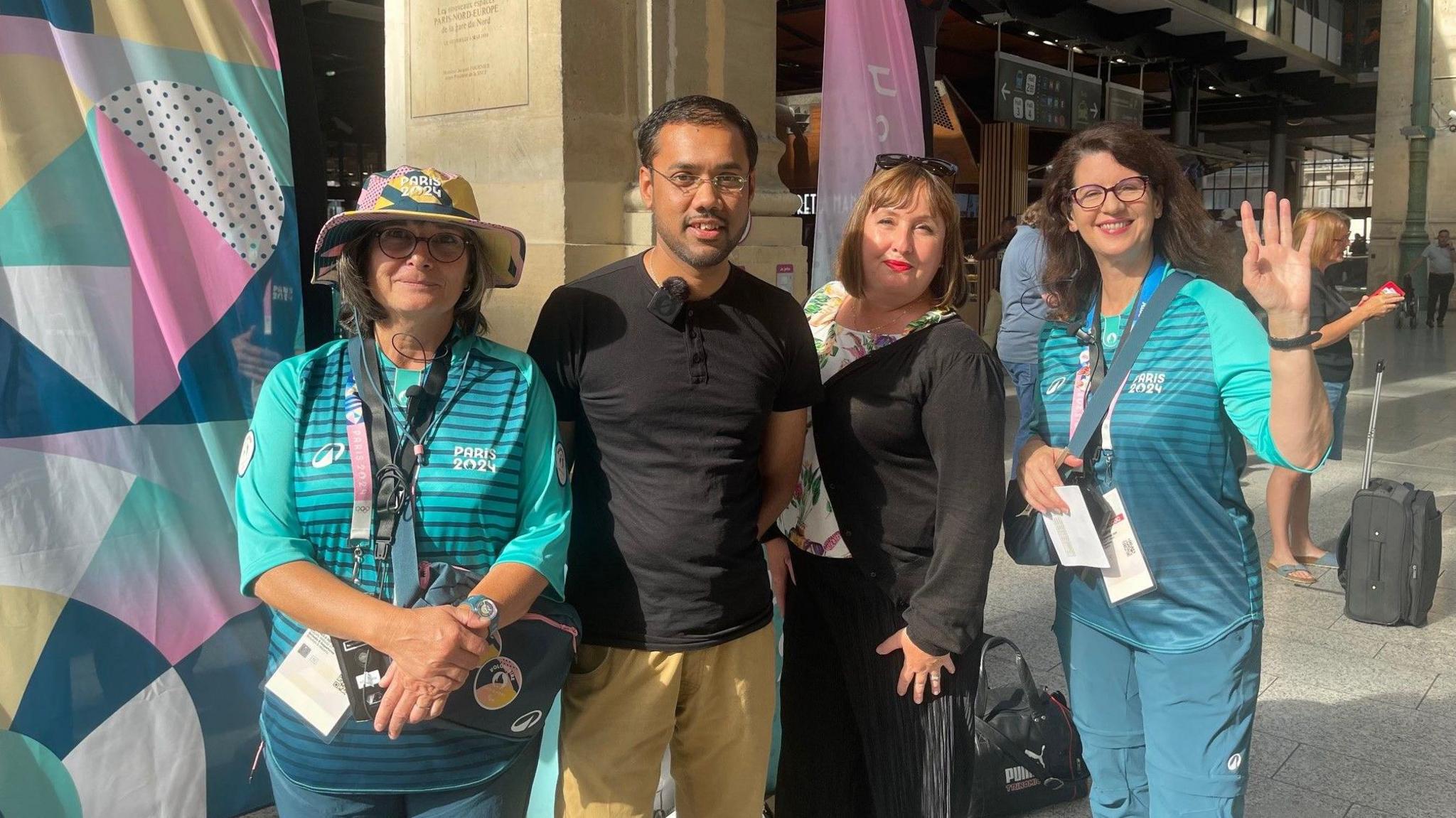 Mohammed with volunteers and journalist Anna O'Neill