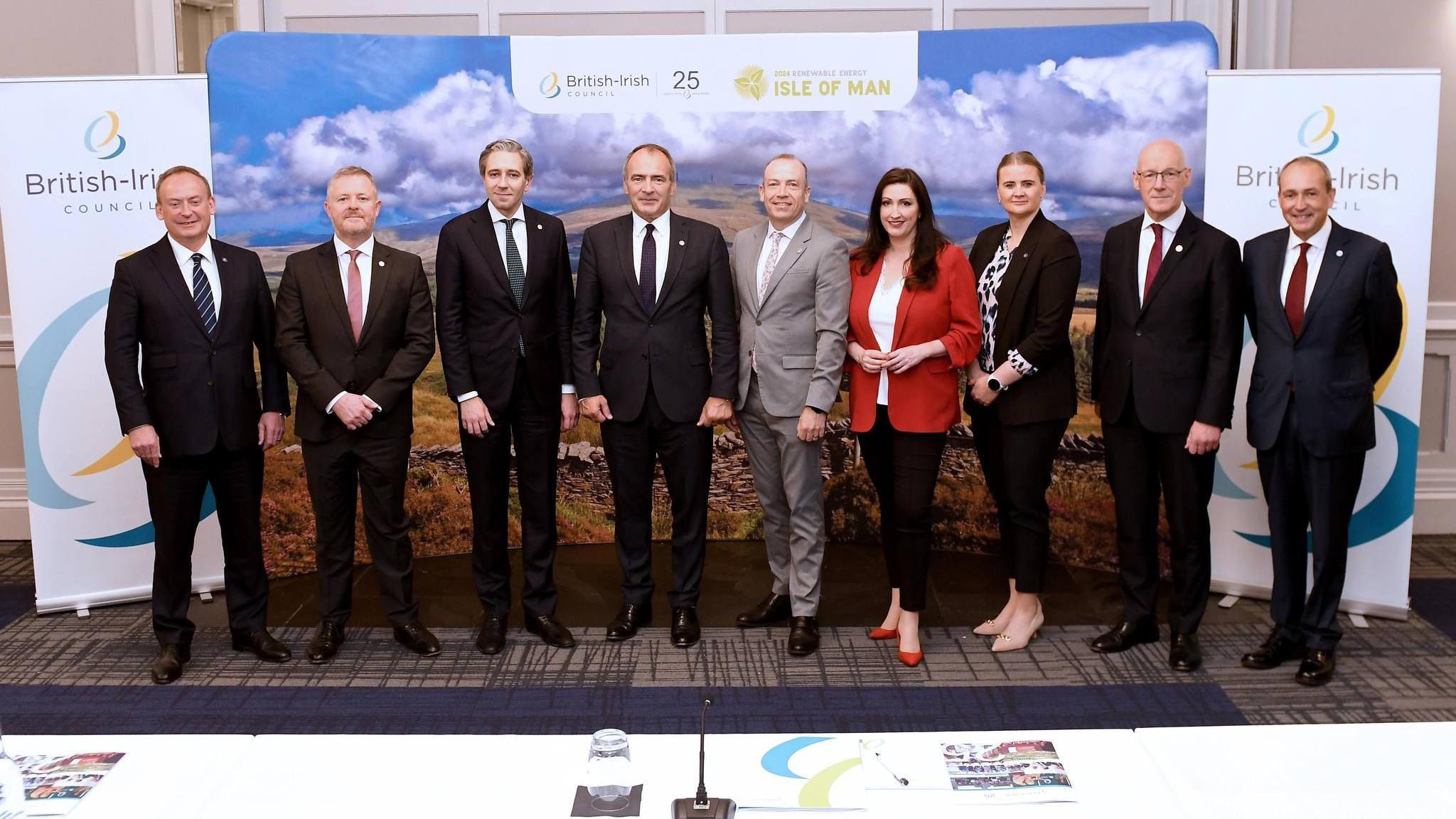 L-R: Chief Minister of Guernsey Deputy Lyndon Trott; Cabinet Secretary for Economy, Energy and Welsh Language Jeremy Miles MS; Taoiseach Simon Harris TD; Chief Minister of the Isle of Man Hon Alfred Cannan MHK; Secretary of State for Northern Ireland Rt Hon Chris Heaton-Harris; Deputy First Minister of Northern Ireland Emma Little-Pengelly MLA; Junior Minister of Northern Ireland Aisling Reilly MLA; First Minister of Scotland Rt Hon John Swinney MSP; Chief Minister of Jersey Deputy Lyndon Farnham