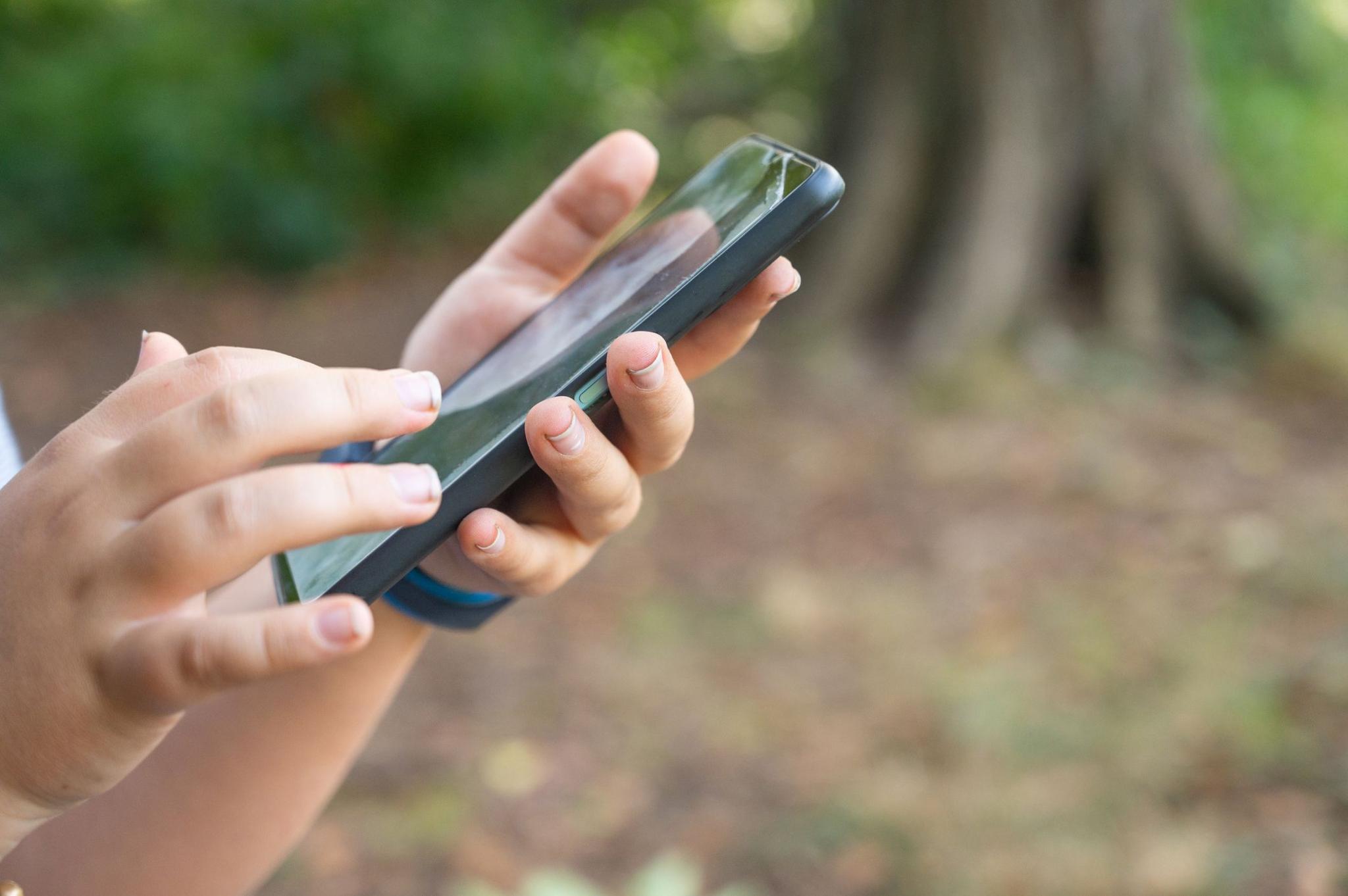 hands holding a smartphone