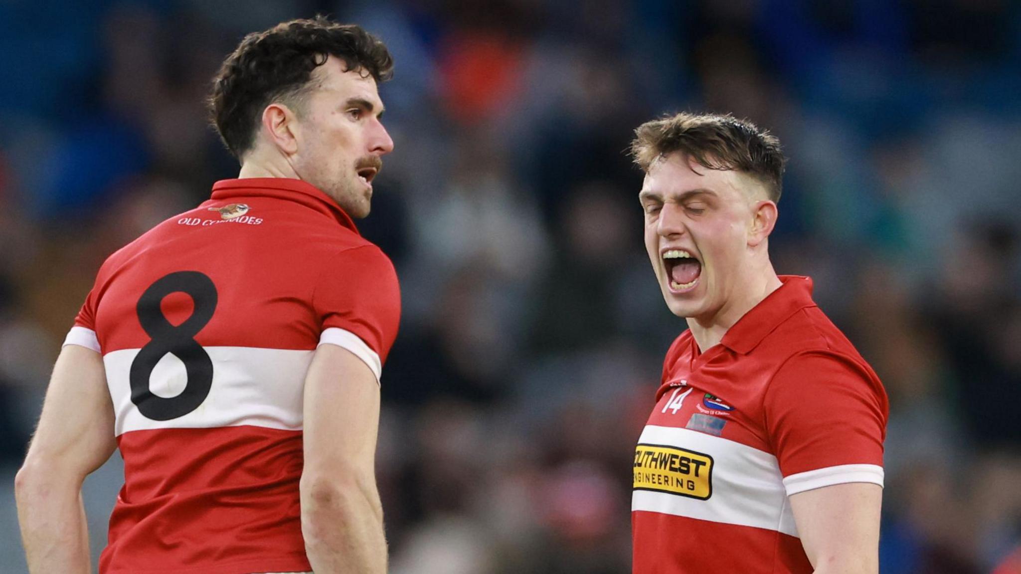 Mark O’Connor celebrates scoring a two pointer with Matthew Flaherty 