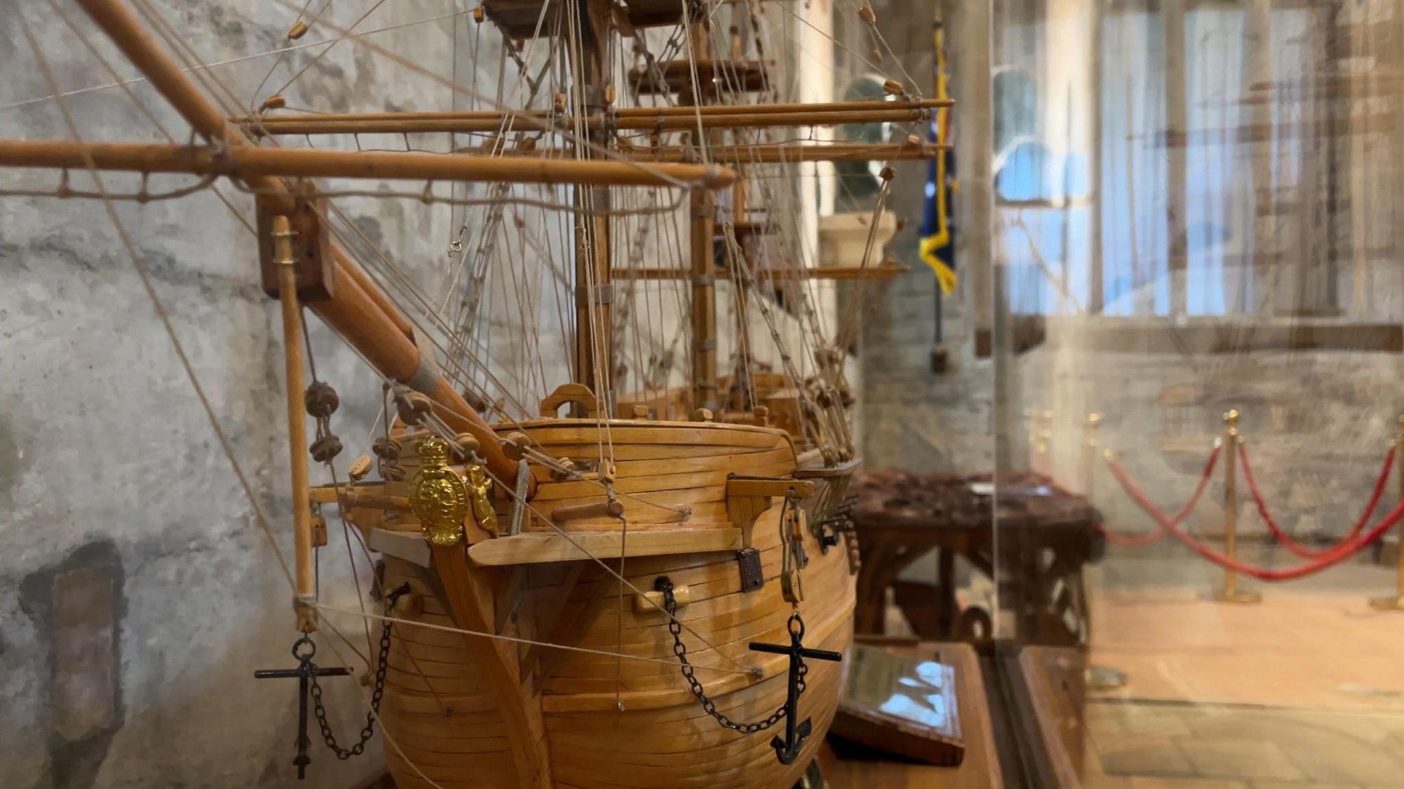 Miniature boat in glass case