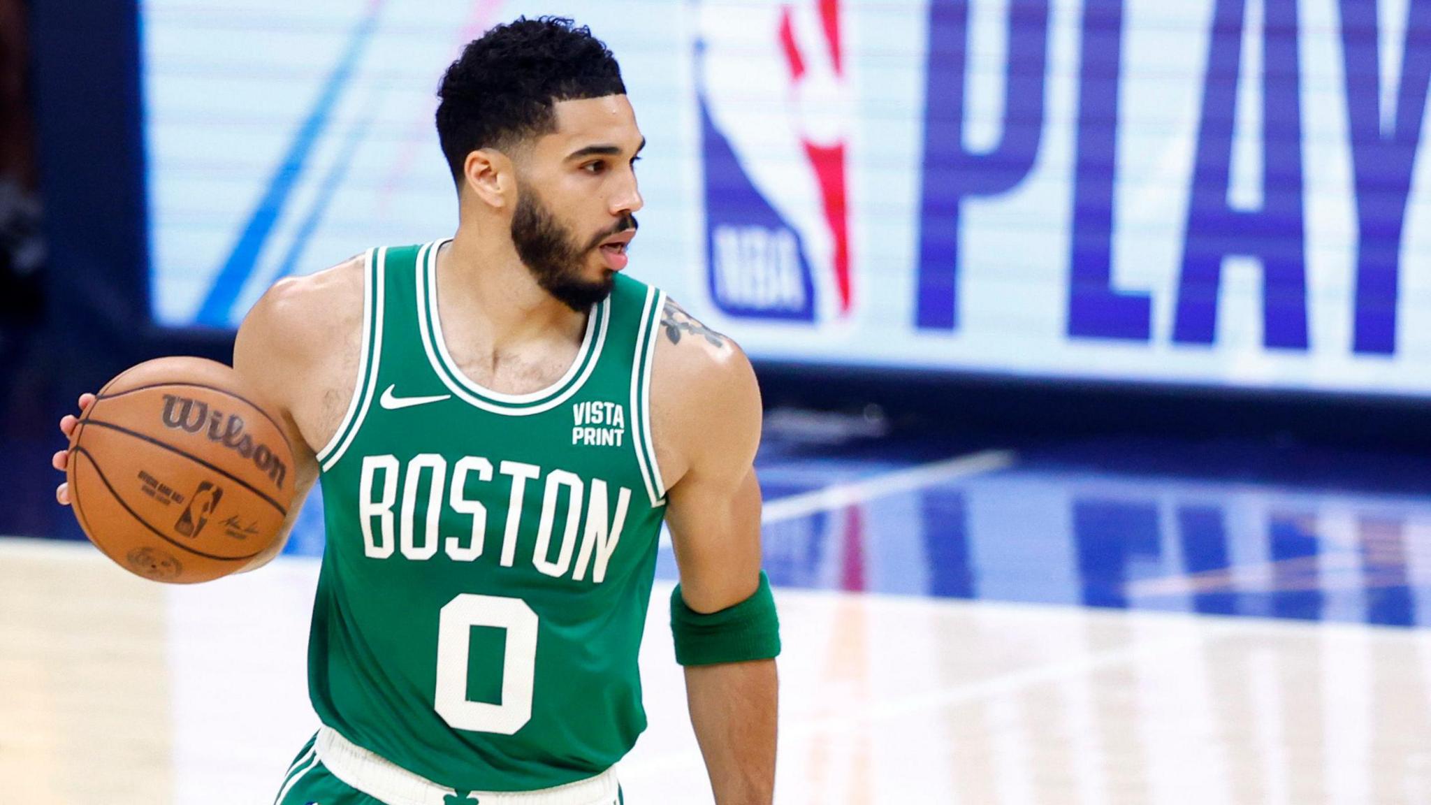 Boston Celtics forward Jayson Tatum dribbles in the first quarter of Game 4 of the 2024 Eastern Conference Finals