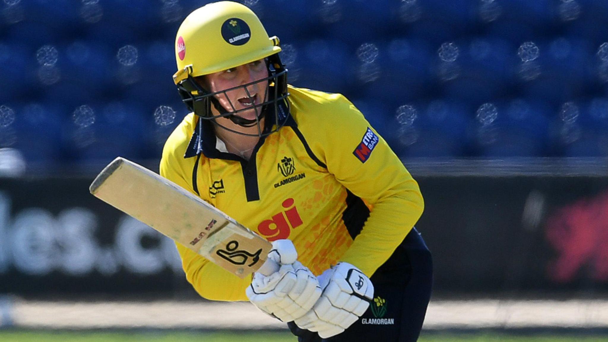 Lauren Parfitt plays a shot and runs