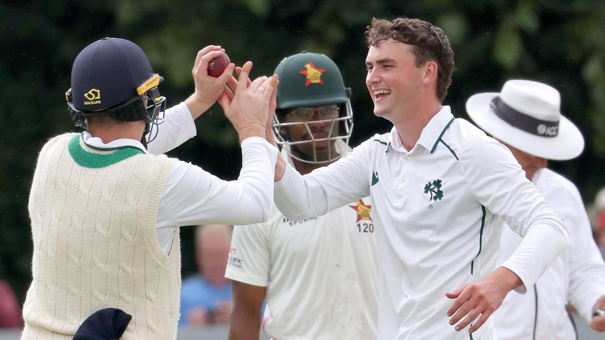 Ireland's Matthew Humphreys celebrates taking the wicket of Brian Bennett